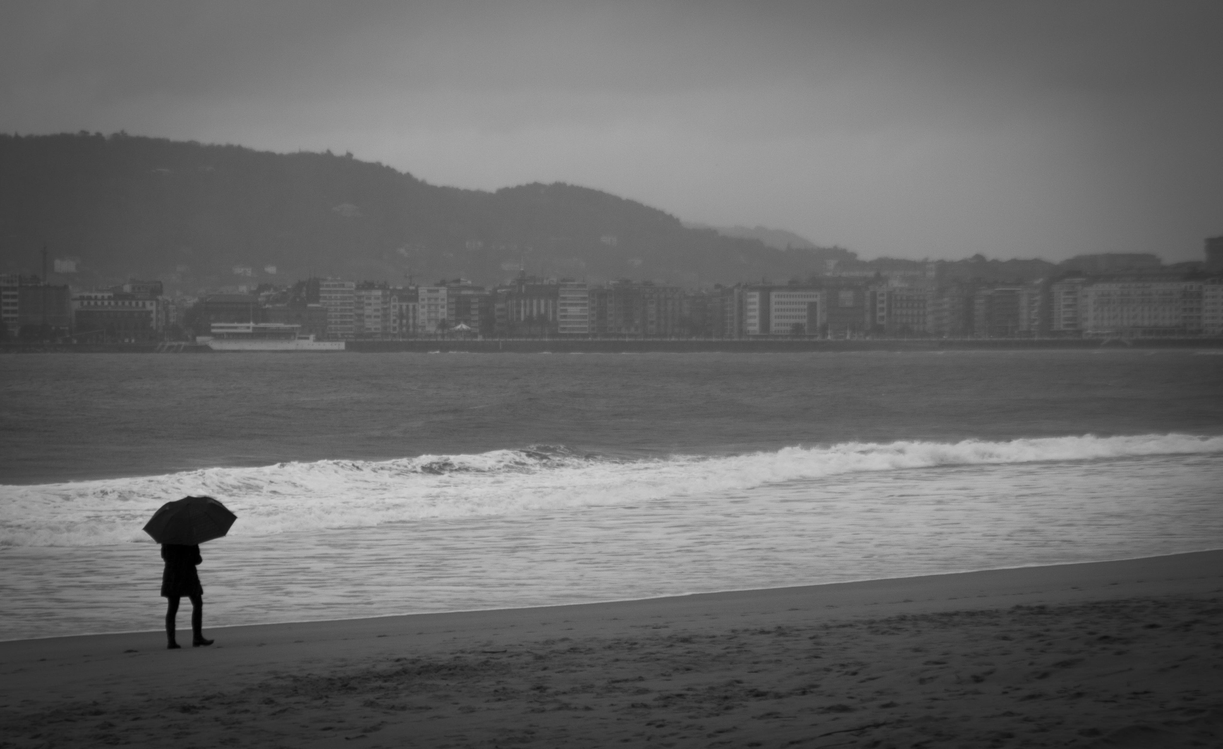 lifestyles, beach, Donostia, empty country, winter, euskadi, shell, standing, Beach, architecture, built structure, water, 4K, outdoors, black and white, HD Wallpaper