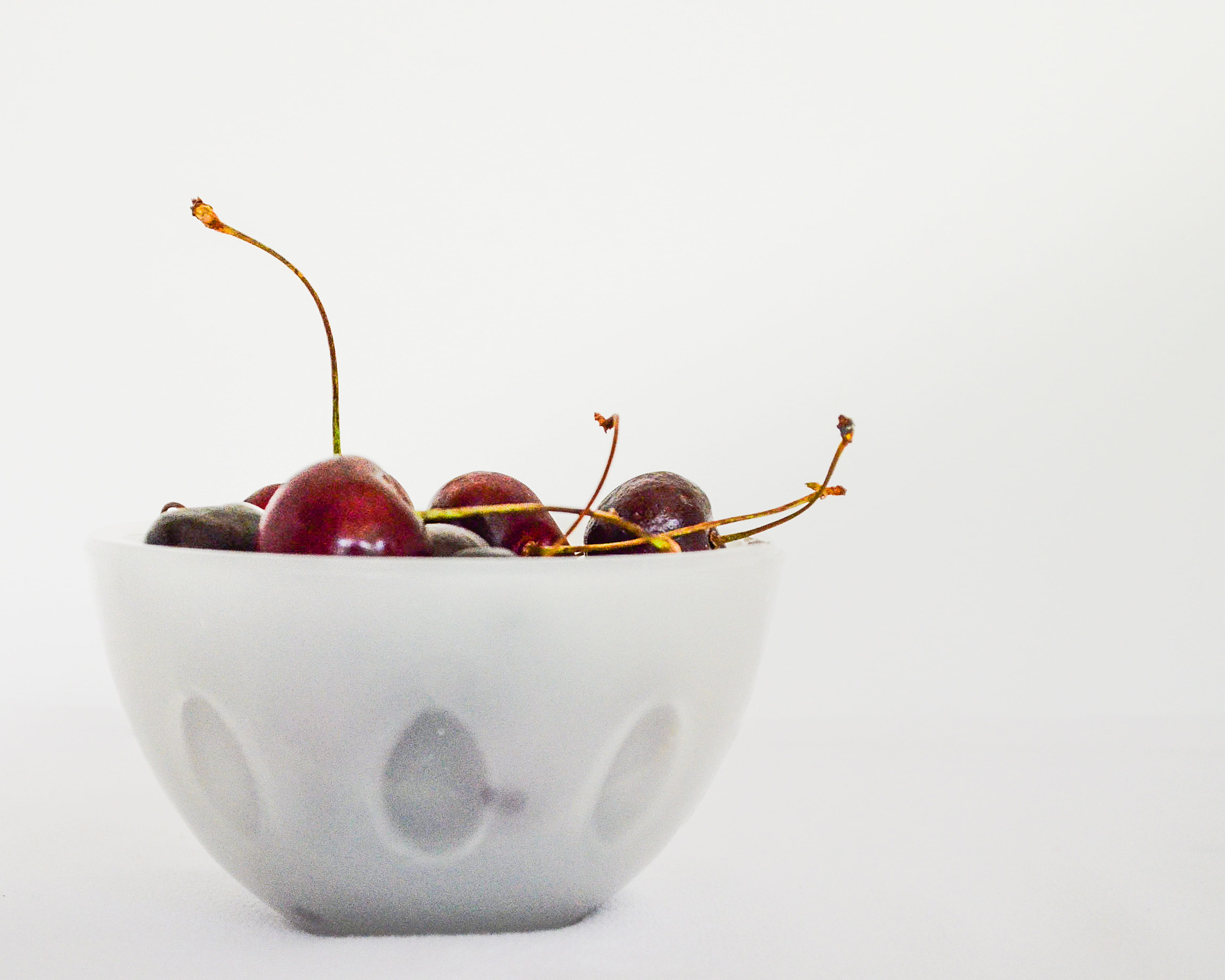 ceramic, food, red, fruit, cherry, freshness, white background, white, wellbeing, berry fruit, cherries, clear, close-up, indoors, glass, still life, food and drink, HD Wallpaper