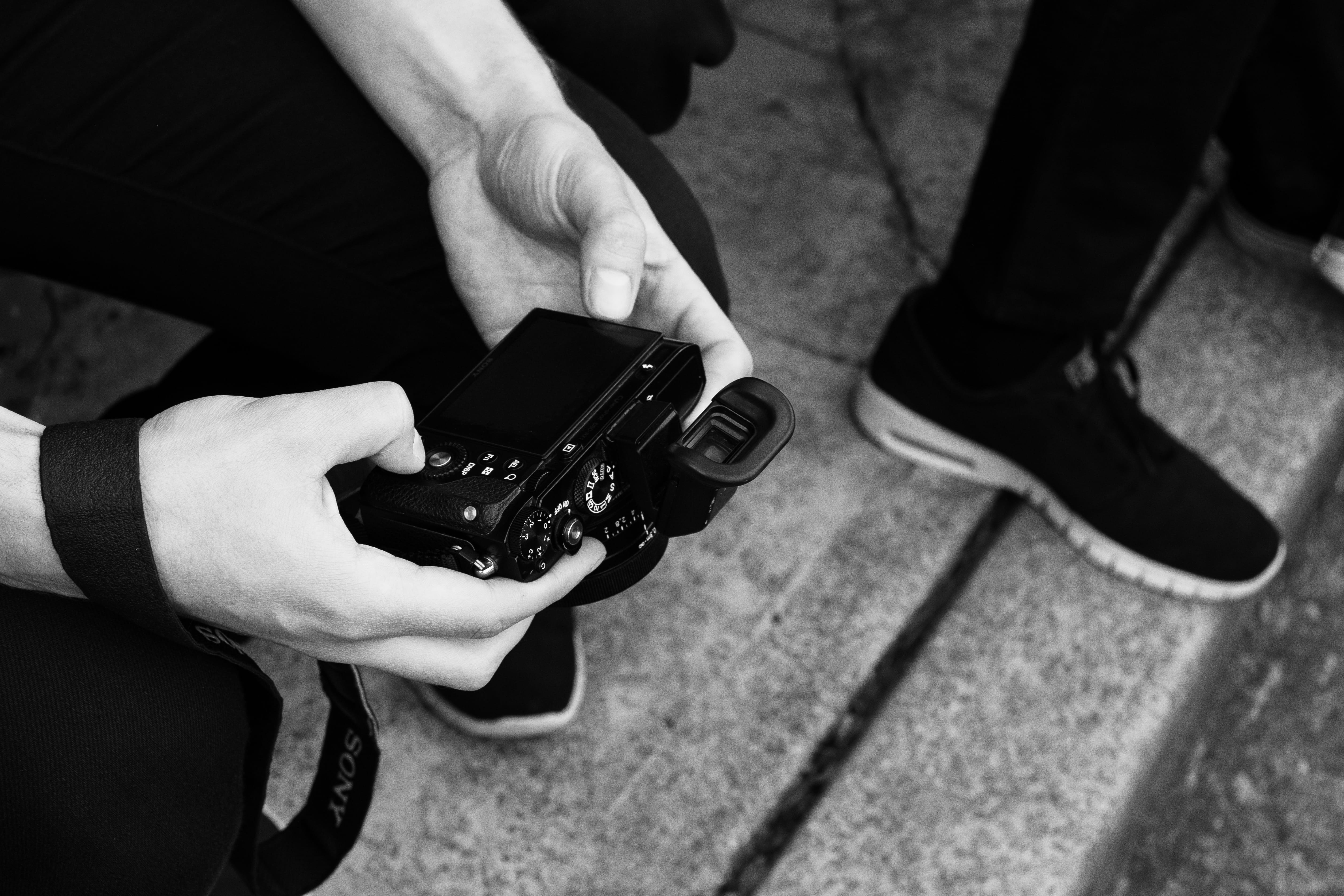 focus on foreground, rx1, mobile phone, real people, clothing, camera, human body part, day, shoe, sausalito, high angle view, low section, skin, digital camera, HD Wallpaper