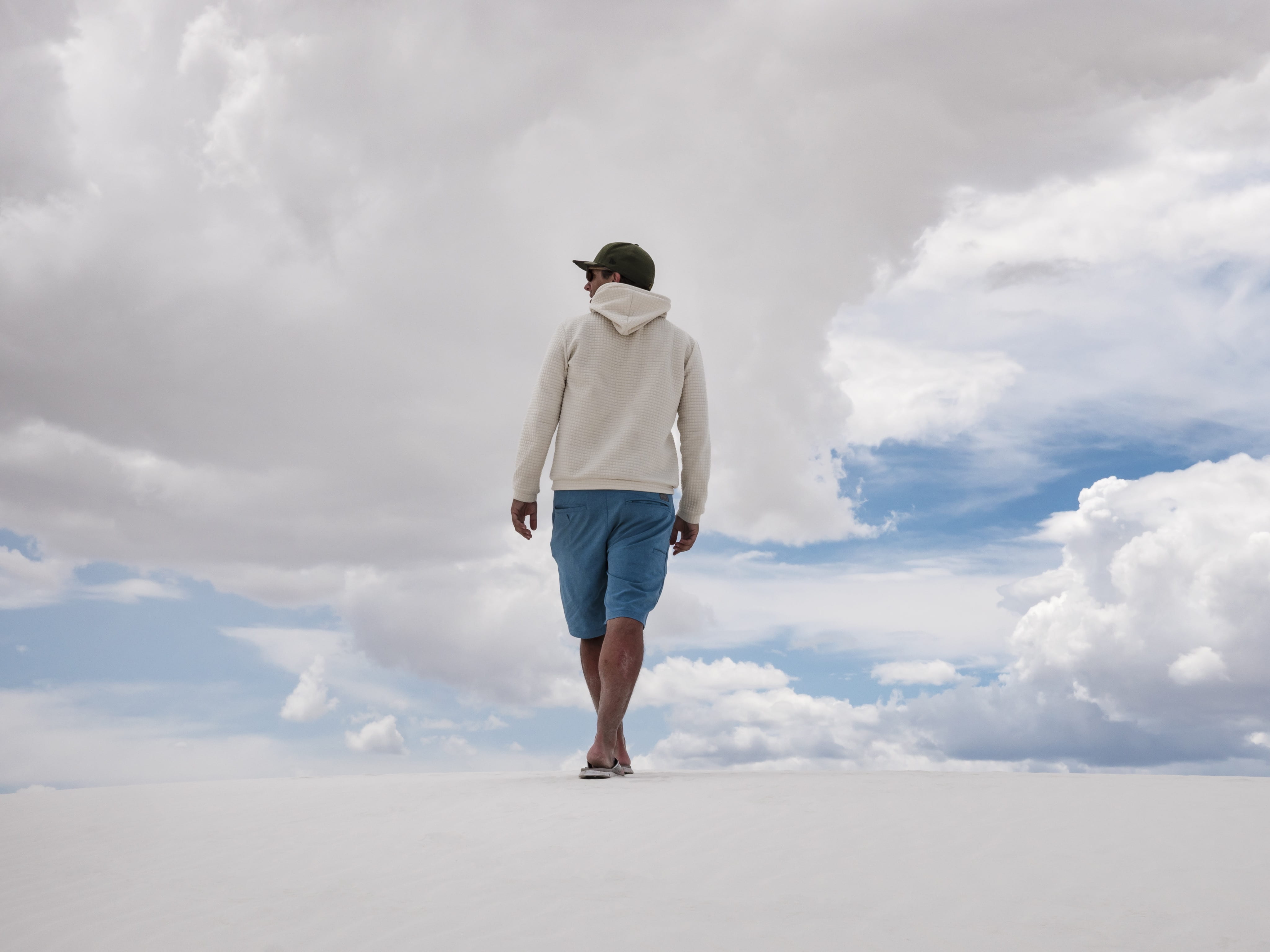walking, earth, blue, young men, hooded, one person, hite, wearing, casual clothing, shorts, beauty in nature, white, male, clouds, cloud - sky, day, cloud, HD Wallpaper