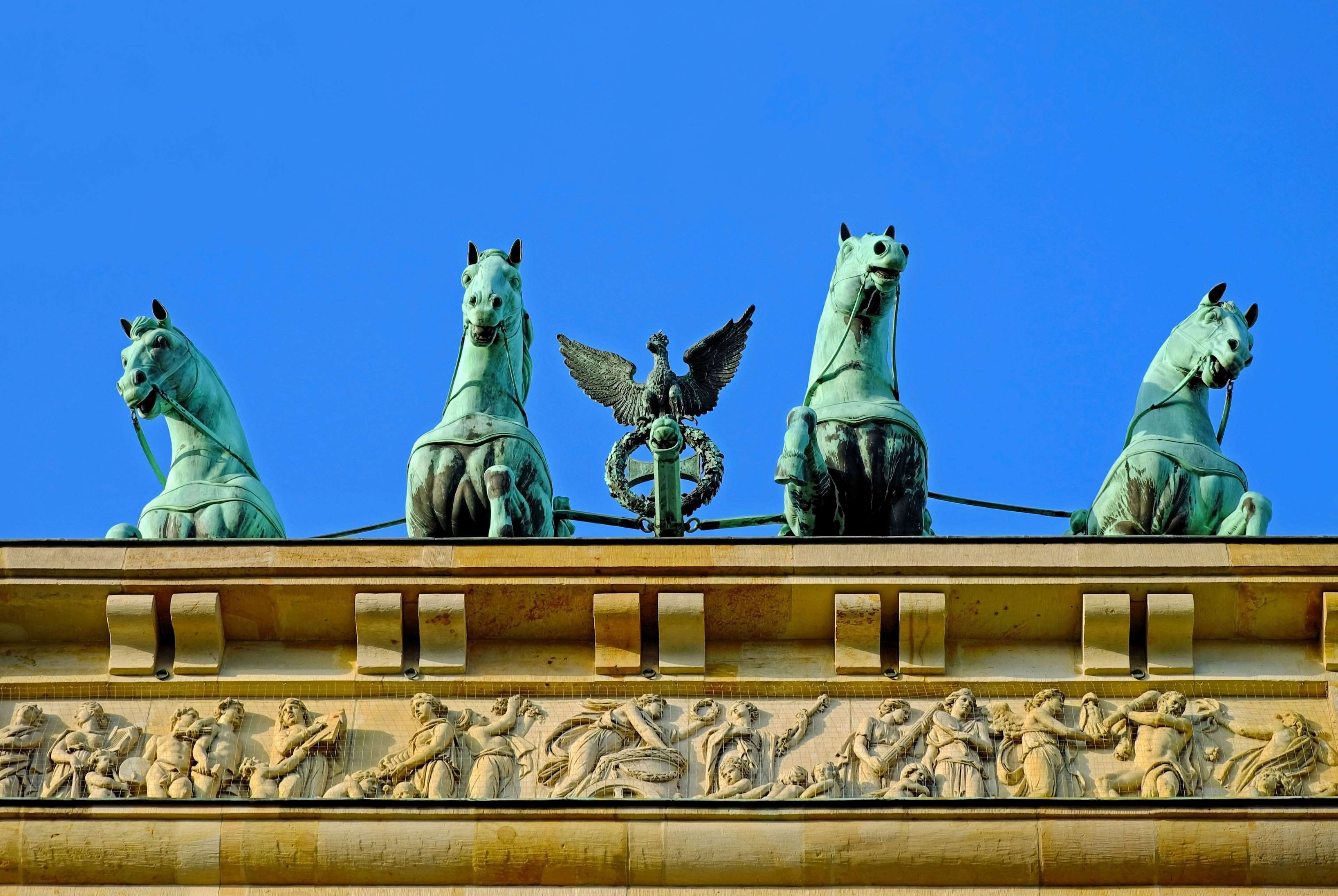 human representation, mammal, built structure, goal, statue, 4K, sky, day, blue, berlin, brandenburg gate, city, draft animals, sculpture, clear sky, animal wildlife, HD Wallpaper