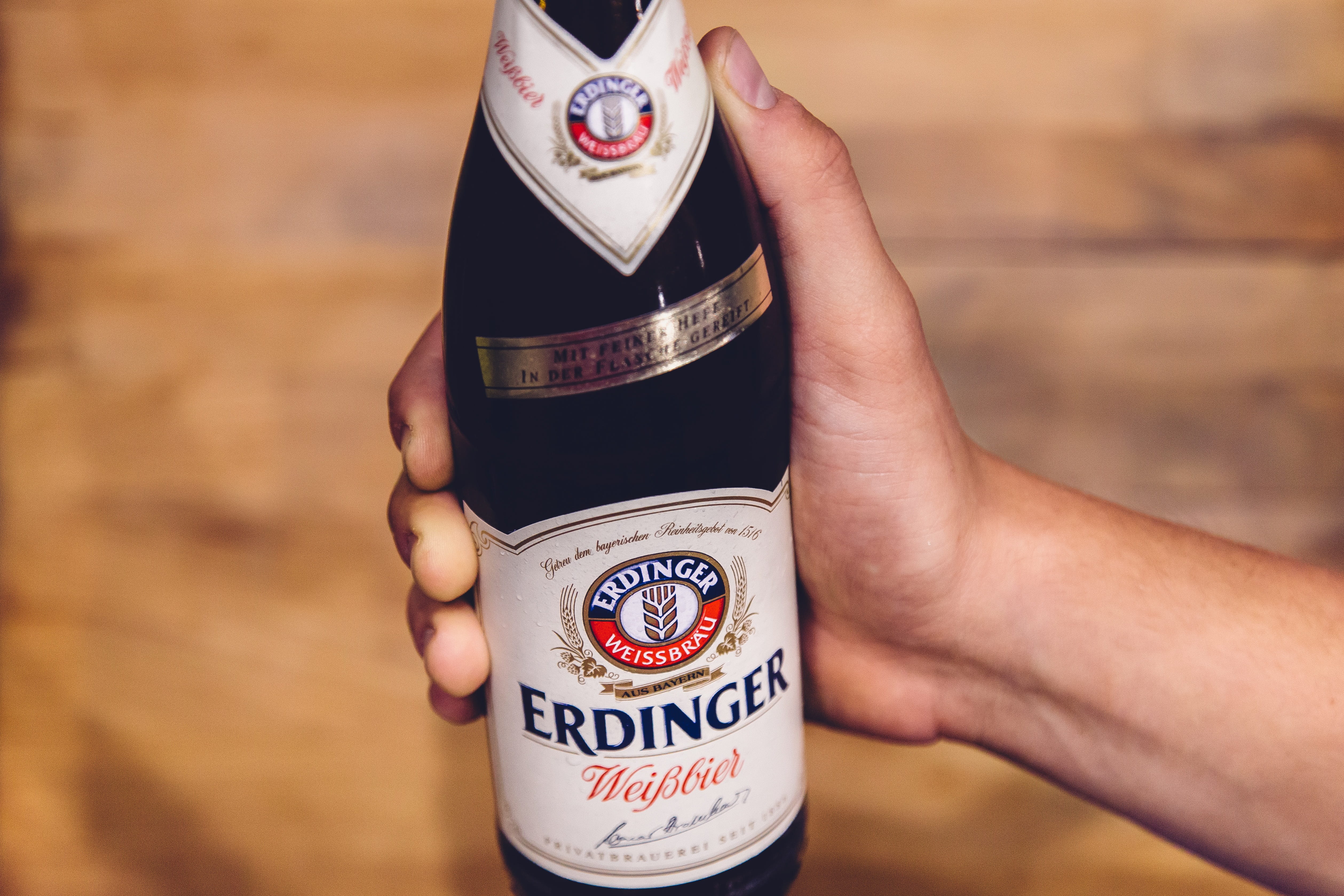 german, human limb, Bottle, hand, alcohol, western script, body part, females, human body part, adult, beer label, White Beer, drink, beer, bavarian, refreshment, HD Wallpaper