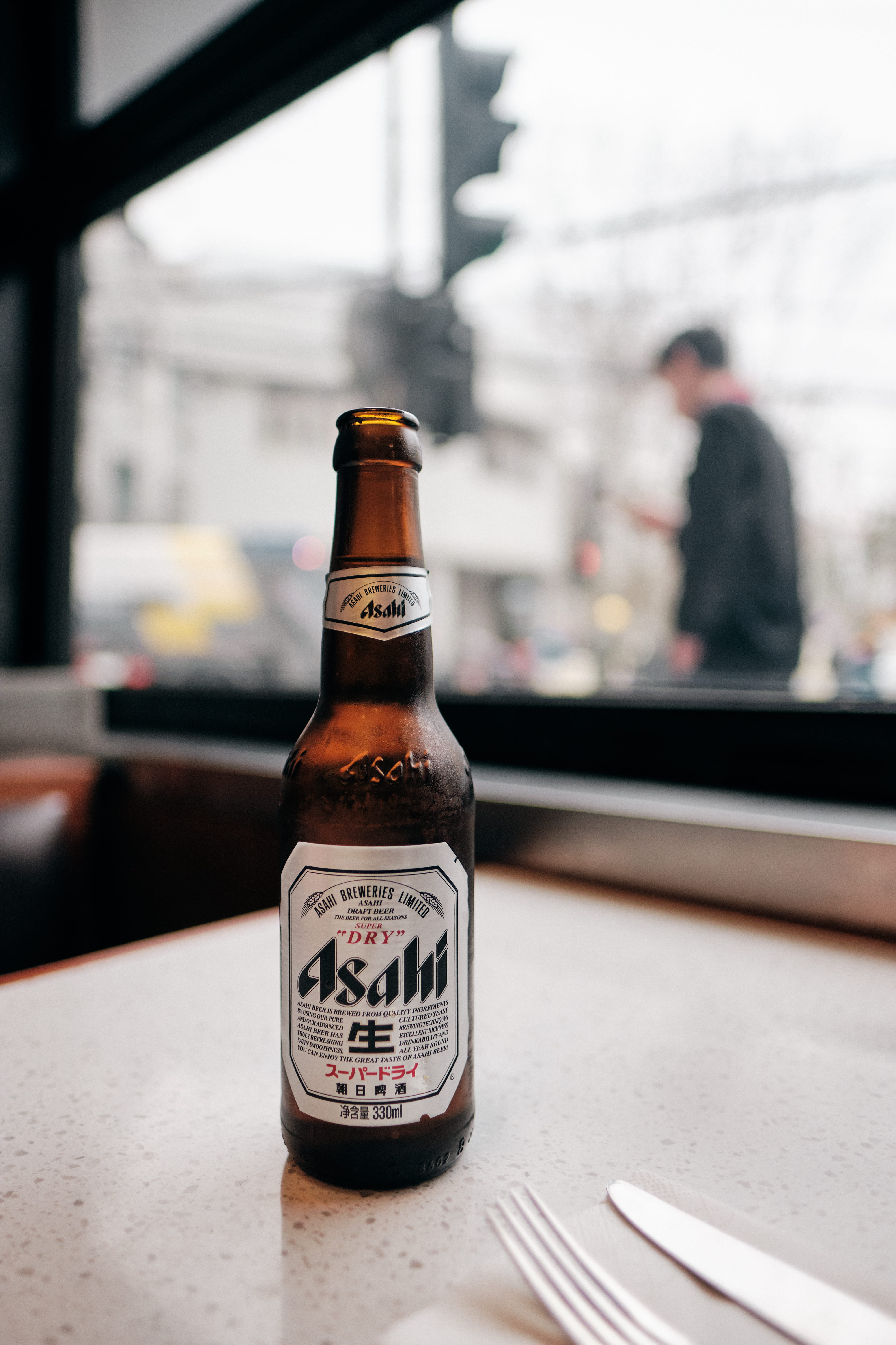 human, table, stout, glass - material, text, china, transparent, sake, glass, focus on foreground, day, indoors, liquor, refreshment, fork, close-up, communication, Phone HD Wallpaper