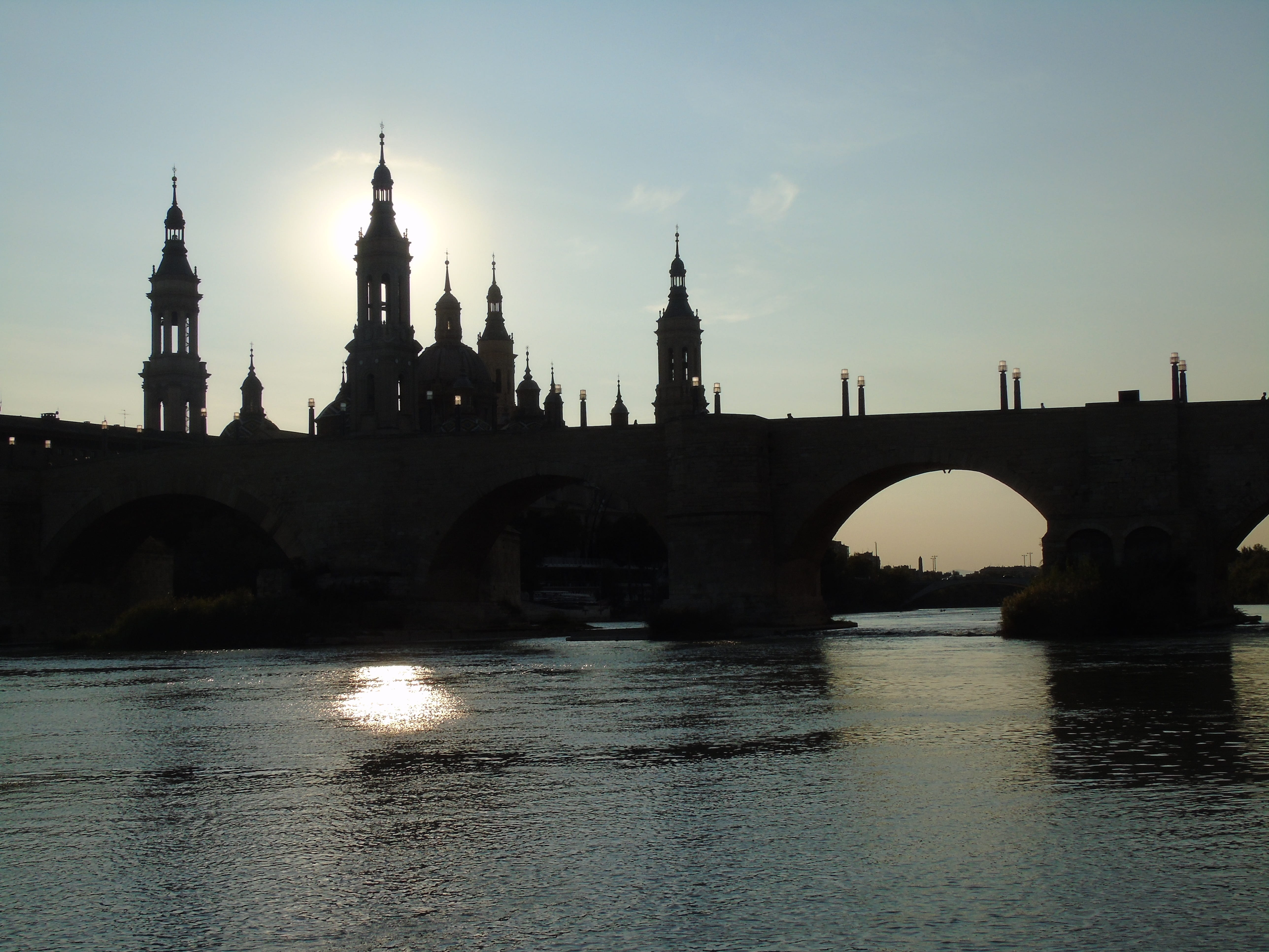 sky, waterfront, spire, structure, pillar, 5K, no people, travel destinations, bridge, saragossa, spain, city, horizon, connection, bridge - man made structure, HD Wallpaper