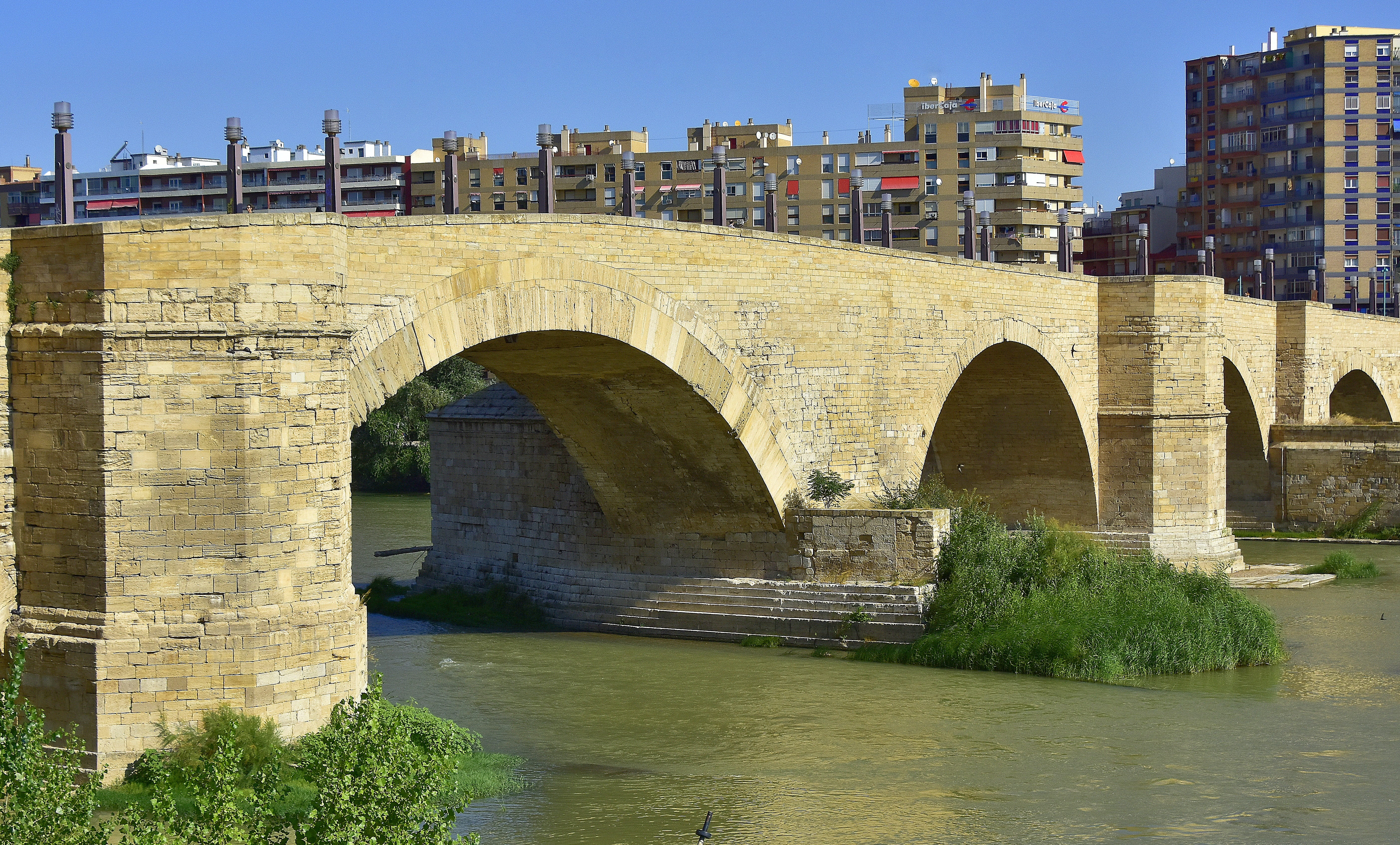transportation, saragossa, built structure, urban, connection, bridge, sky, arch, clear sky, monument, arch bridge, waterfront, historical, building exterior, HD Wallpaper