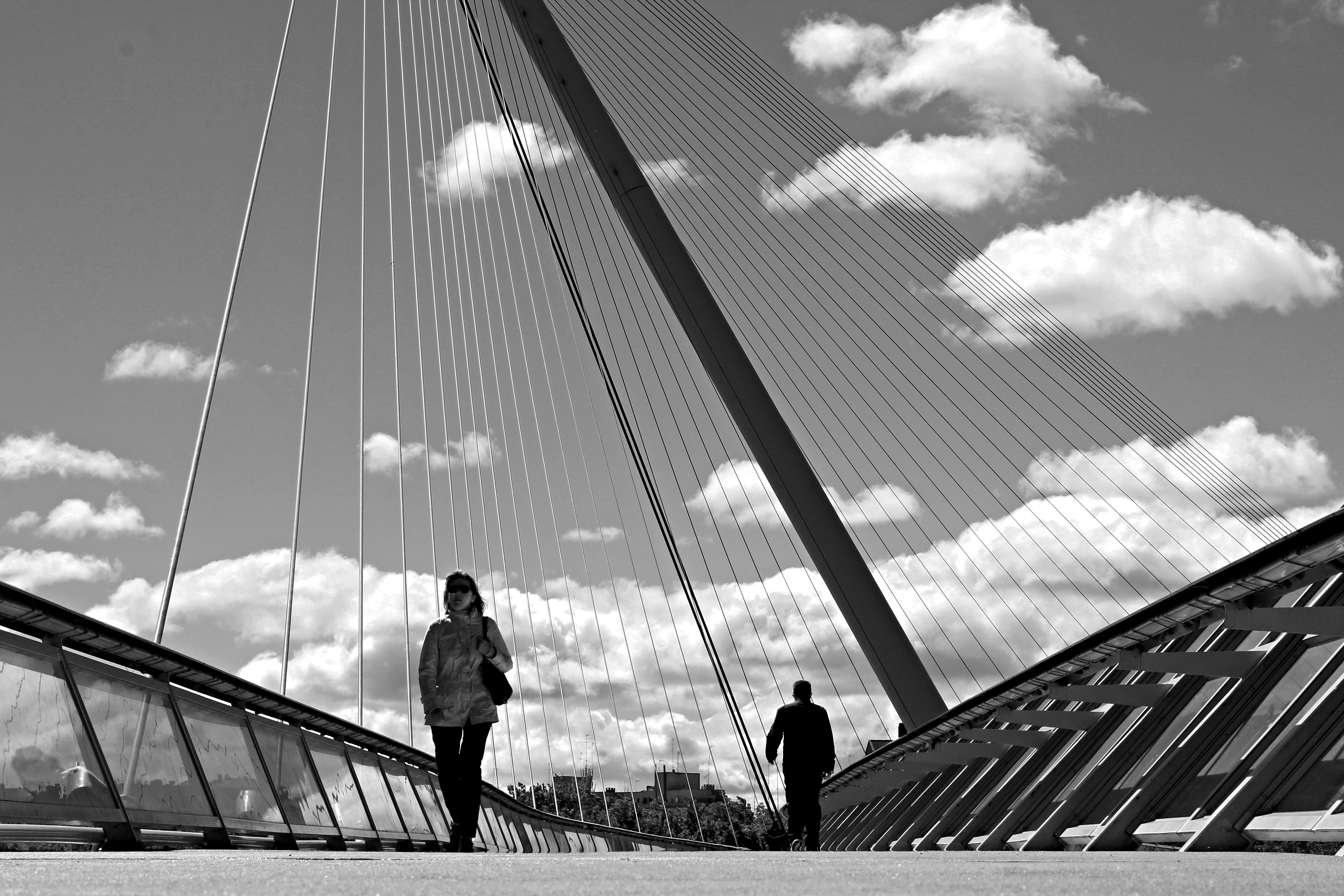 clouds, outdoors, life, cloud - sky, street, bridge - man made structure, suspension bridge, lifestyles, houses, leisure activity, brightness, light, urban, HD Wallpaper