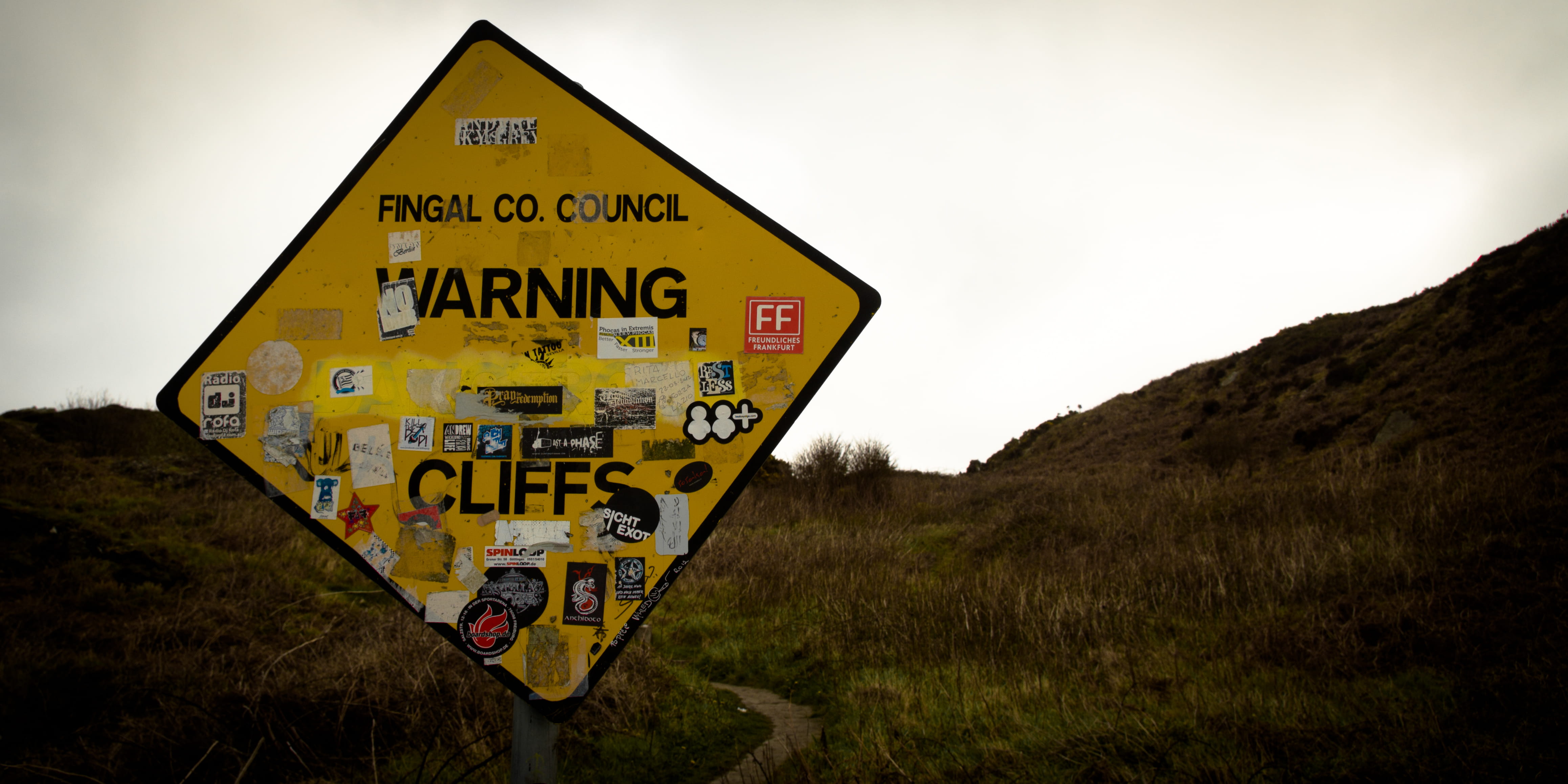 road sign, sticker, nature, land, island, ireland, mountain, warning sign, capital letter, information sign, yellow, sign, field, guidance, dublin, sky, HD Wallpaper