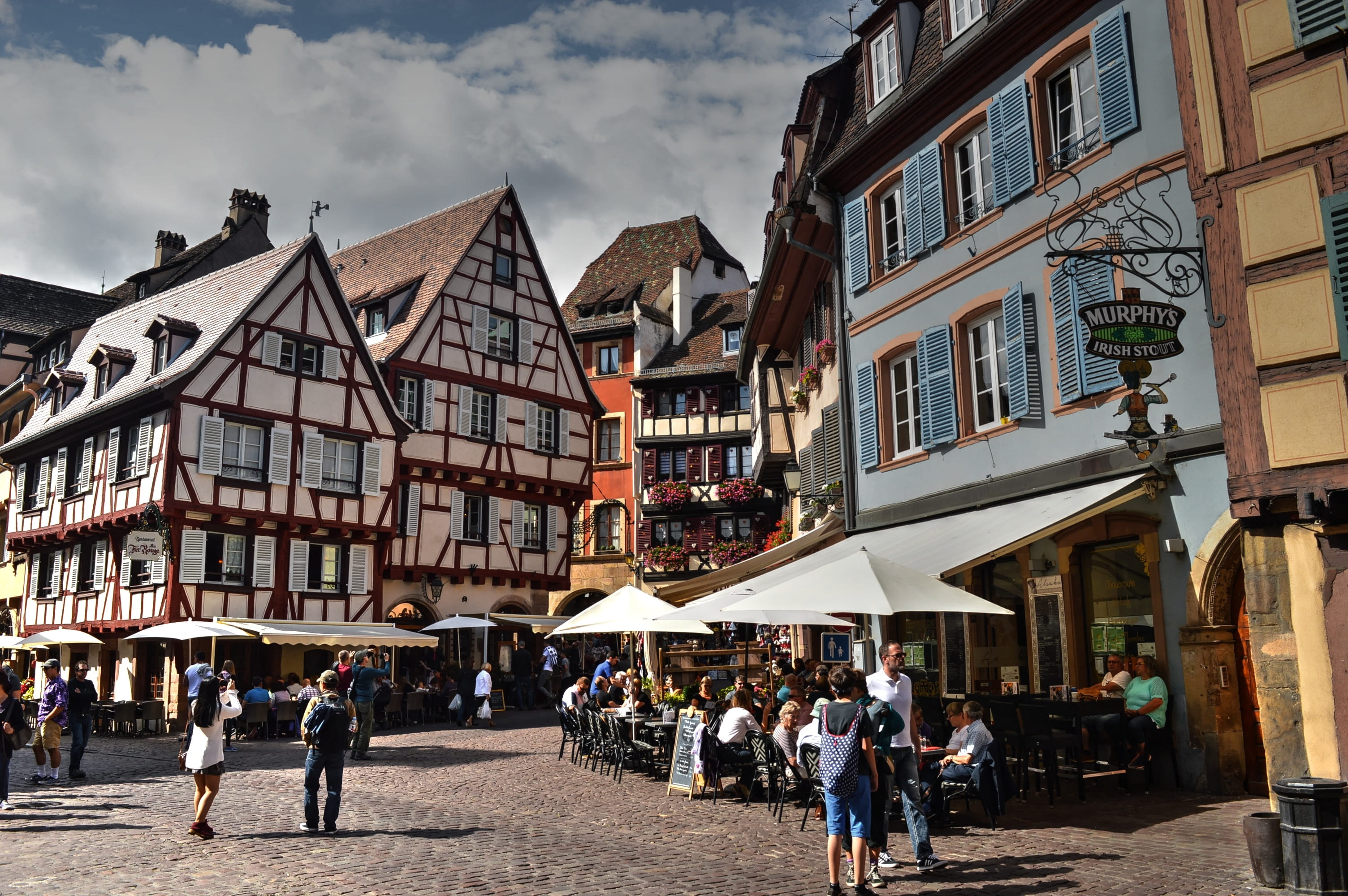 house, residential district, sky, 2K, city, real people, incidental people, crowd, built structure, group of people, building, Timber-Framed, Colmar, cloud - sky, HD Wallpaper
