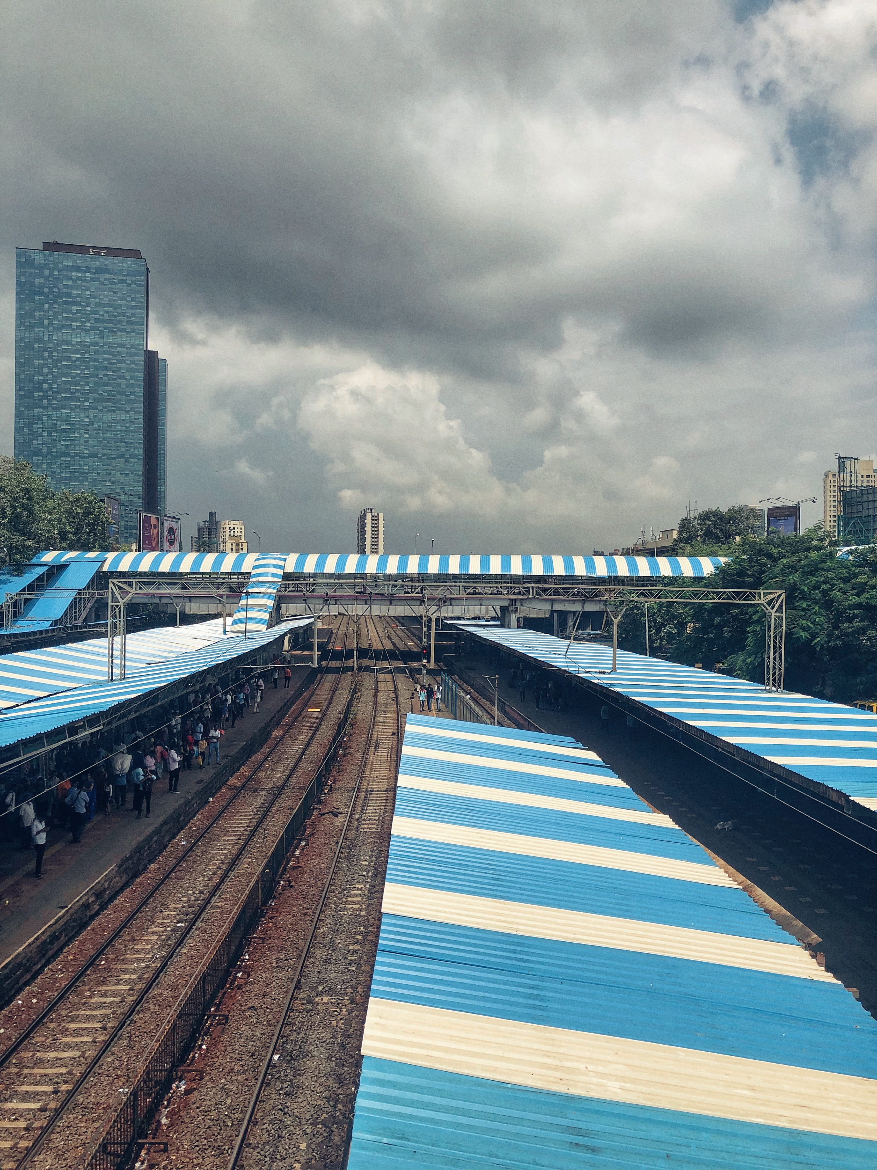 clouds, cloud - sky, mumbai, building exterior, dadar, office building exterior, skyscraper, station, outdoors, the way forward, travel, bridge, blue, built structure, Phone HD Wallpaper