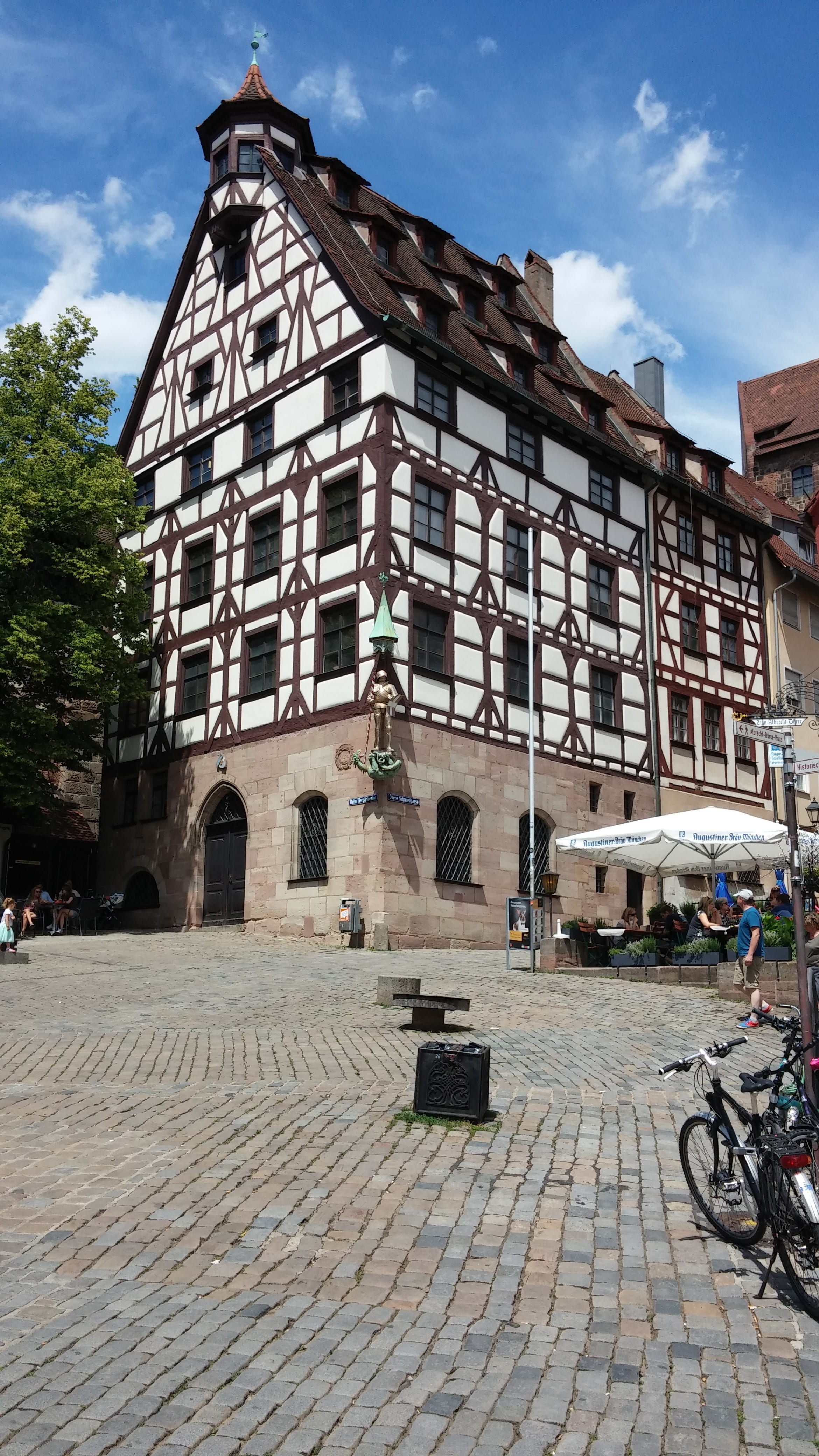 fachwerkhaus, building exterior, built structure, bicycle, nuremberg, sky, street, architecture, 4K, albrecht dürer, cobblestone, outdoors, cloud - sky, Phone HD Wallpaper