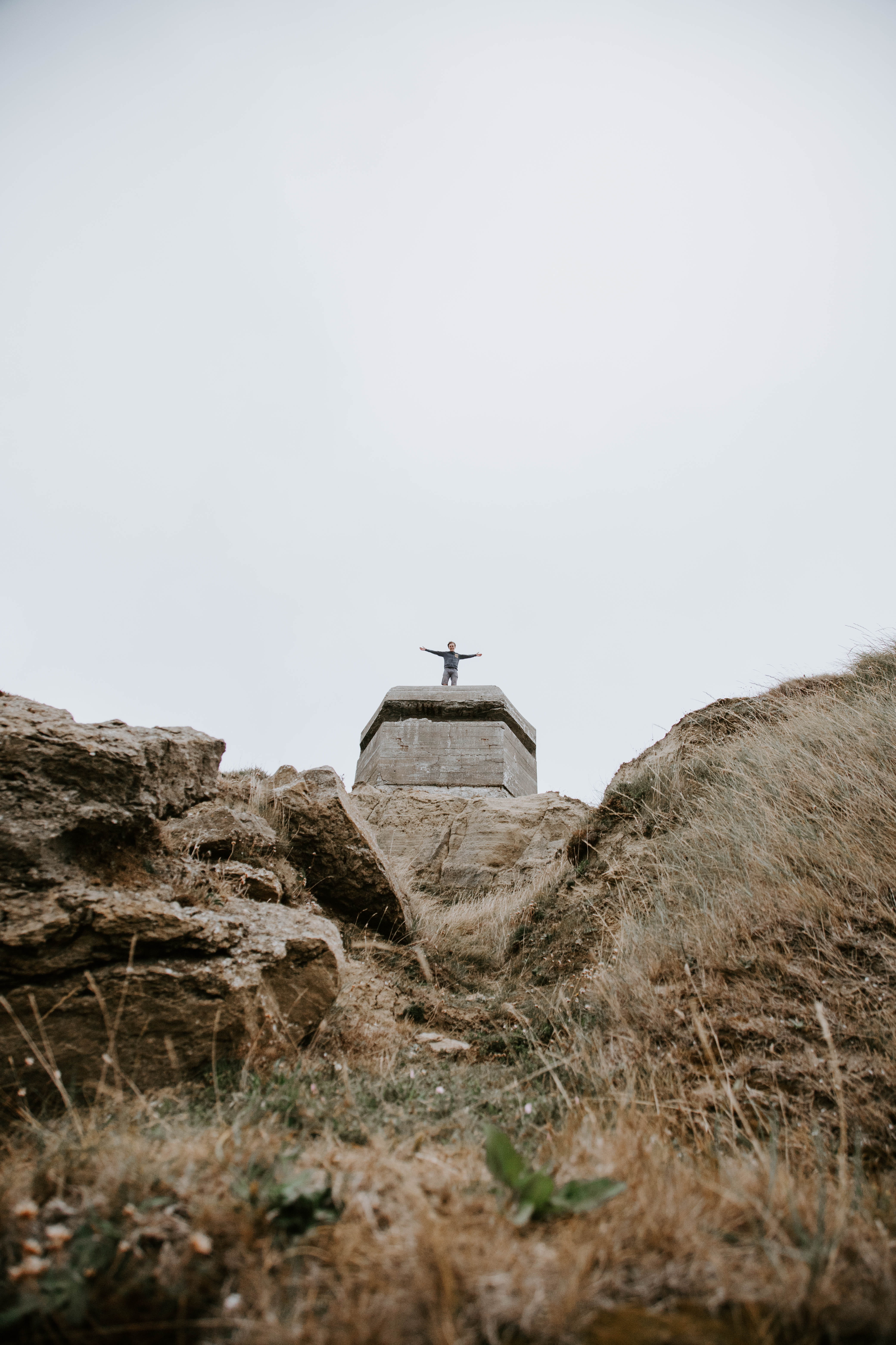 arms outstretched, low, famous Place, landscape, mountain, church, angle, open arms, tower, stone Material, outdoors, statue, grass, scenics, Phone HD Wallpaper