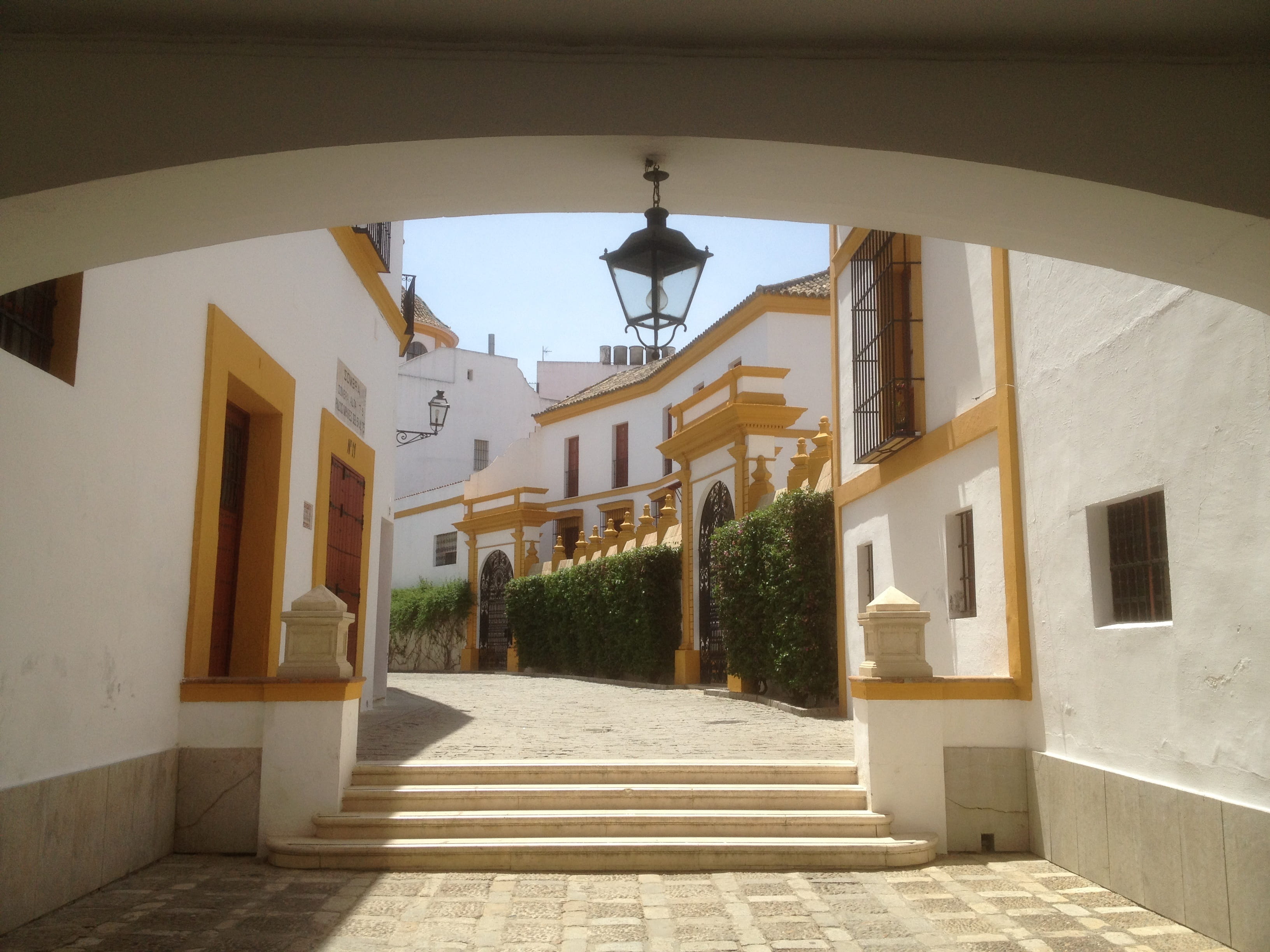 direction, outdoors, seville, building exterior, electric lamp, luxury, door, architecture, summer, sunlight, the way forward, arch, no people, plant, day, HD Wallpaper