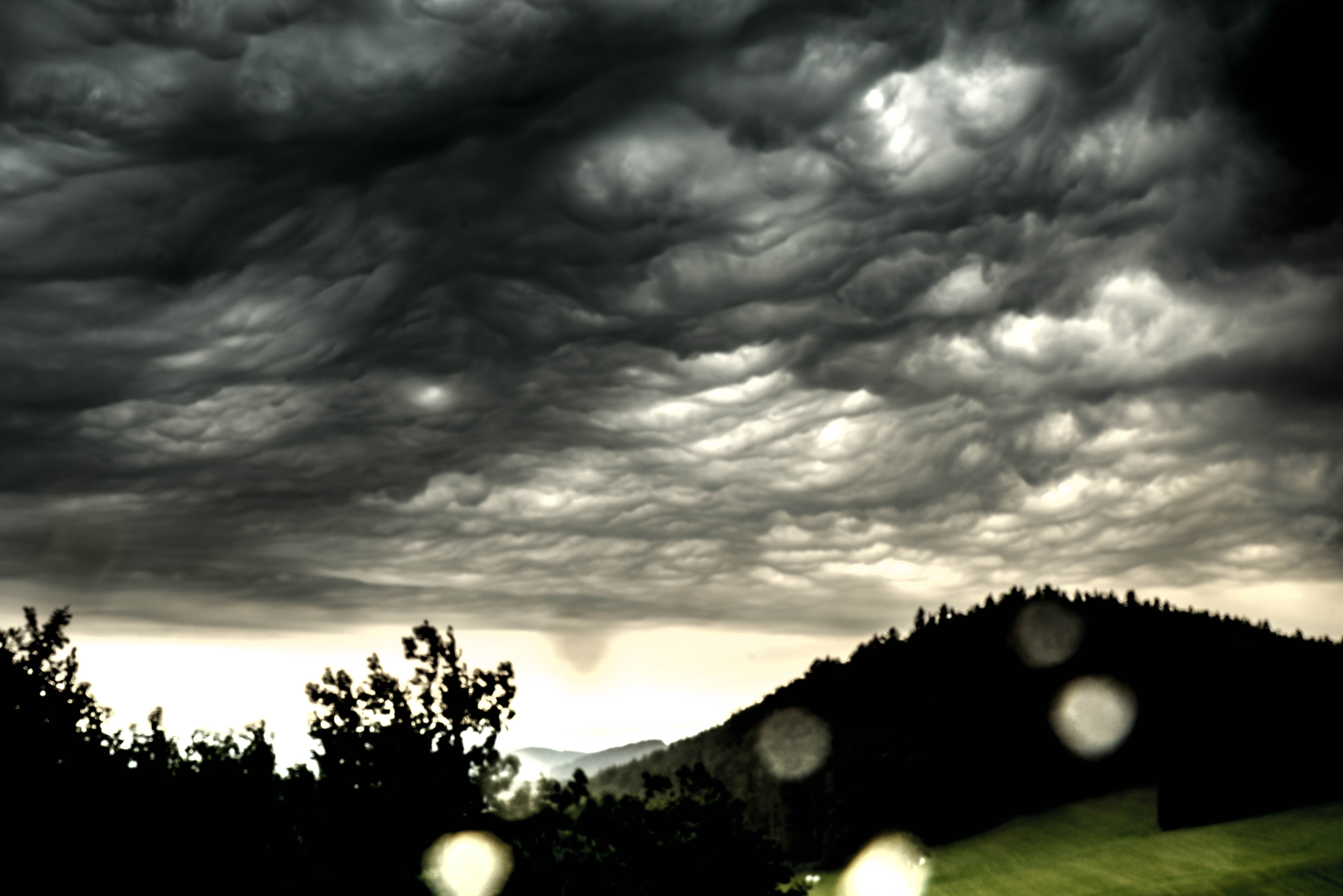overcast, low angle view, ominous, dramatic sky, countryside, architecture, tree, storm cloud, sky clouds, beauty in nature, hills, 5K, mammatocumulus, HD Wallpaper