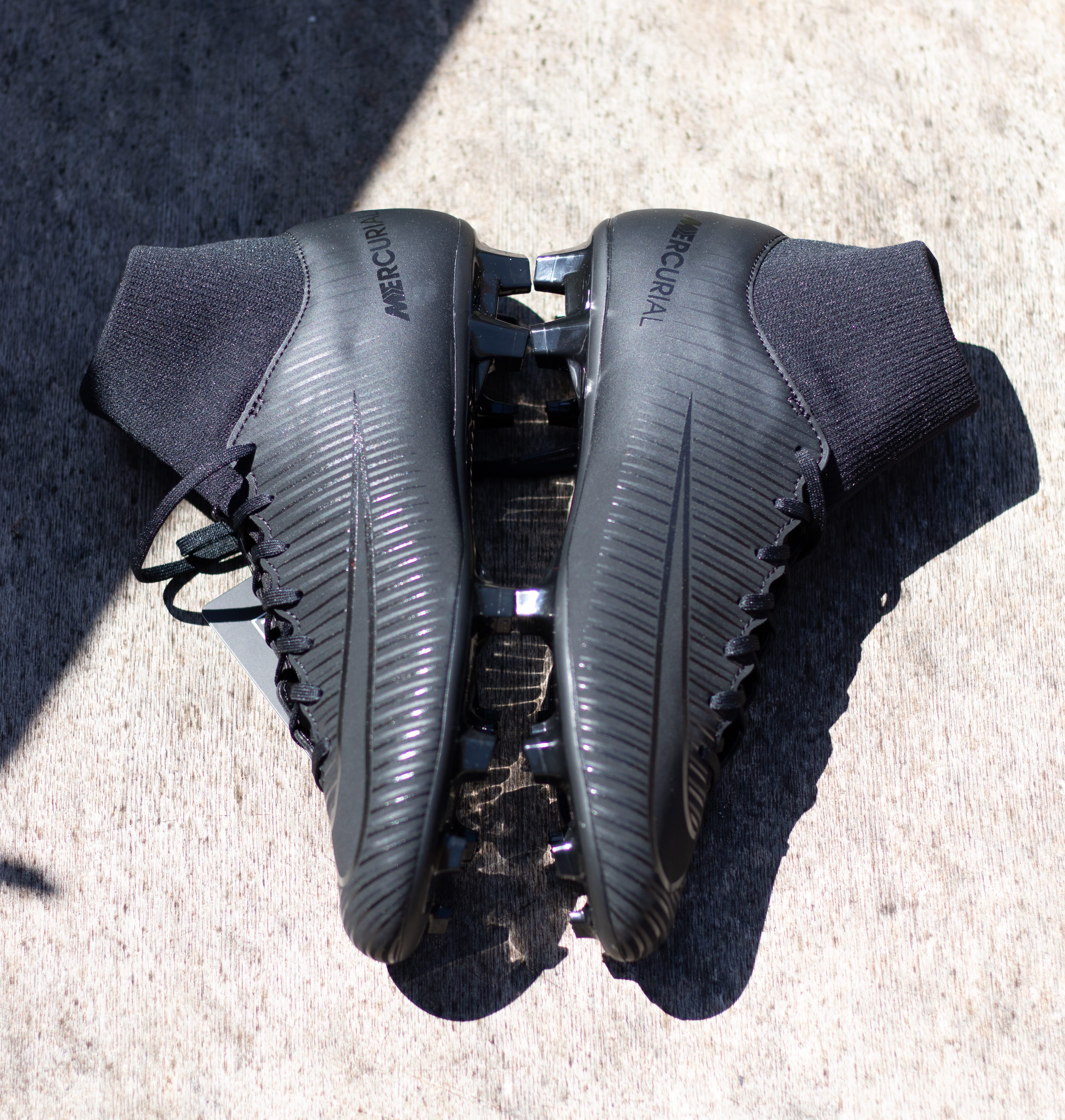 football boots, personal accessory, boots, camera - photographic equipment, land, sunny, outdoors, photography themes, shadow, absence, 4K, day, football, Phone HD Wallpaper
