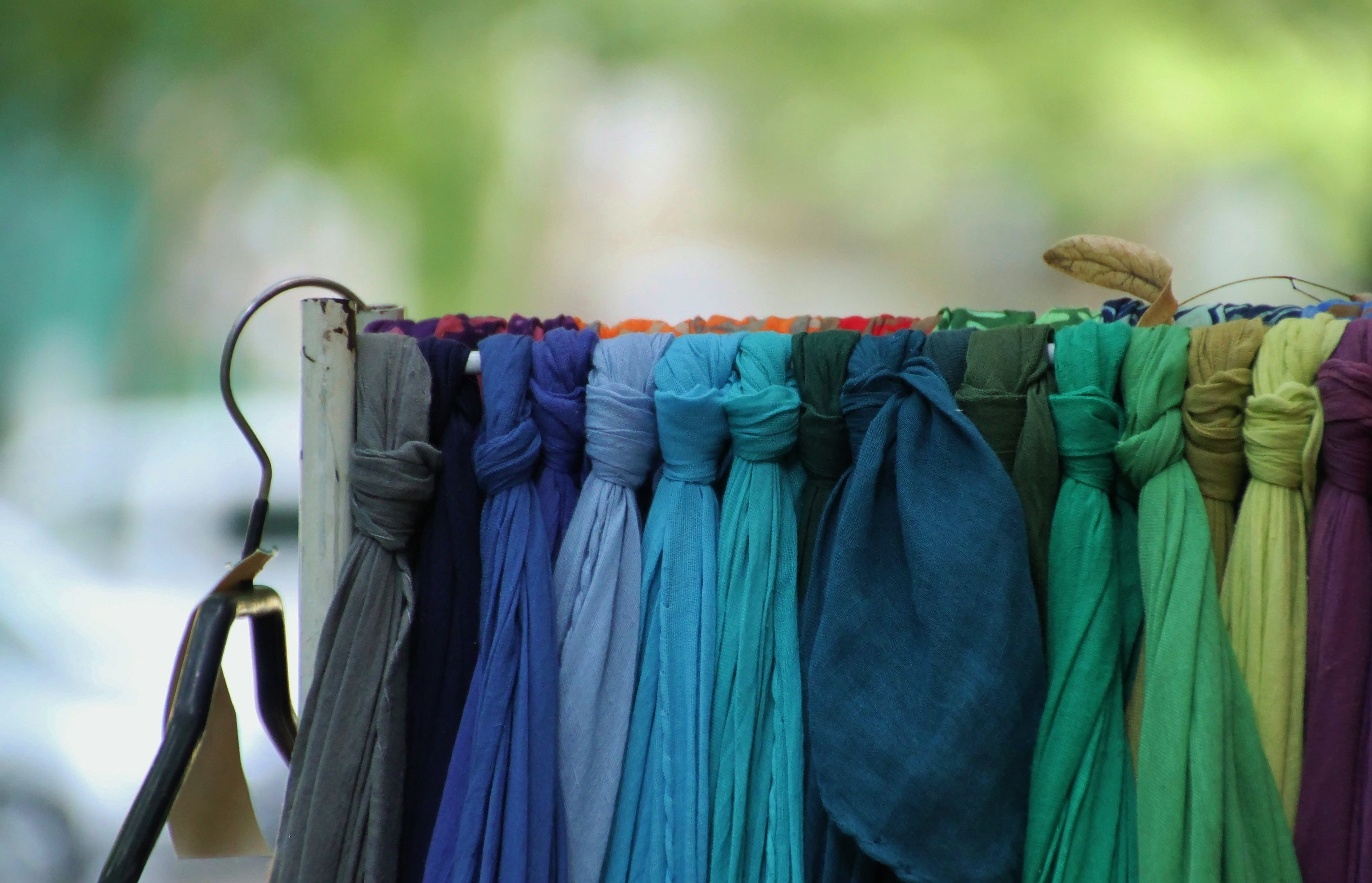 colorful scarves, substances, rack, blouse, 4K, colorful, multi colored, focus on foreground, day, store, choice, in a row, coat hanger, lot, textile, HD Wallpaper