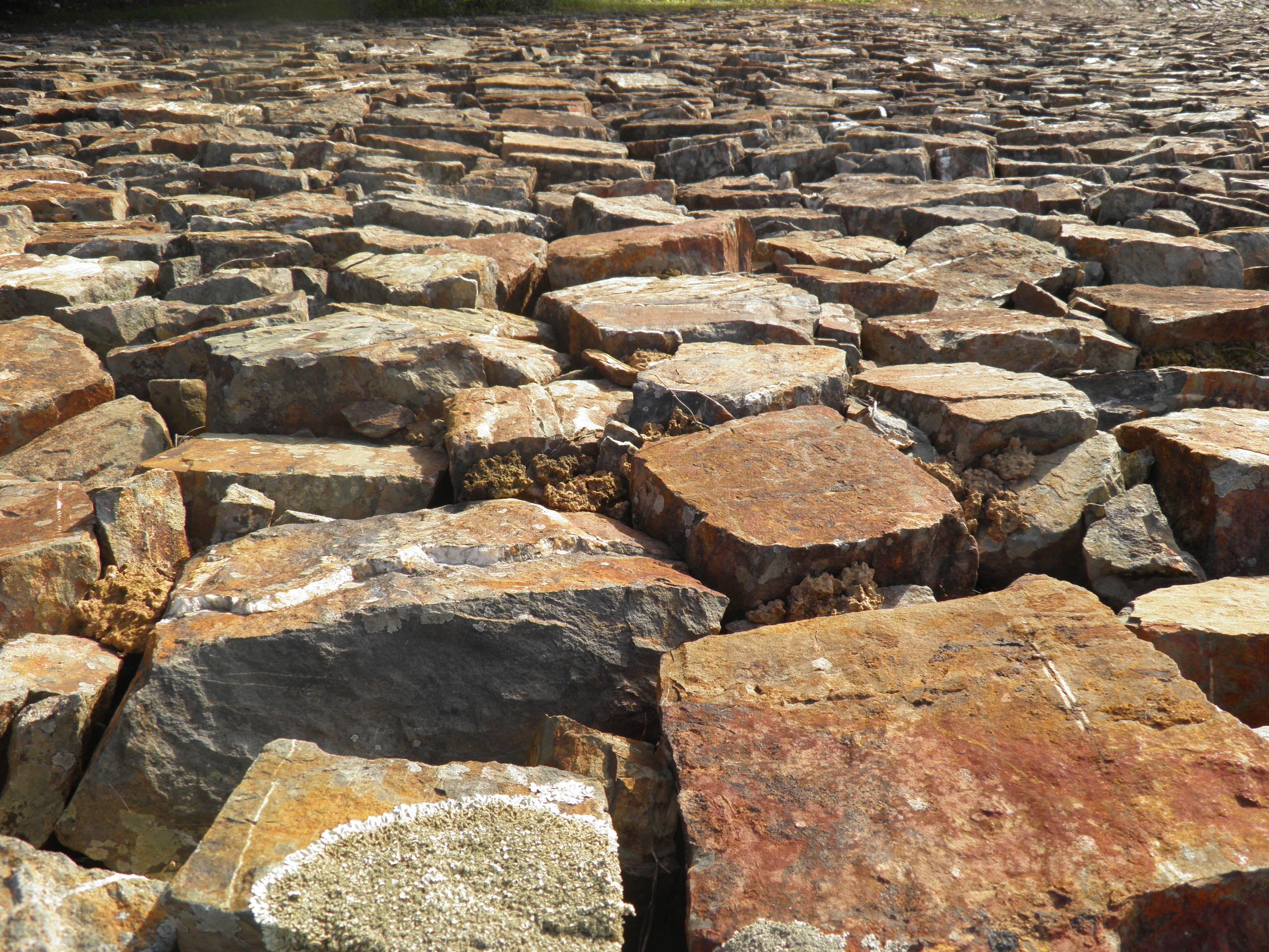 stone Material, brown, stone wall, rock, rocks, sunlight, textured, backgrounds, history, high angle view, full frame, built structure, no people, large group of objects, HD Wallpaper