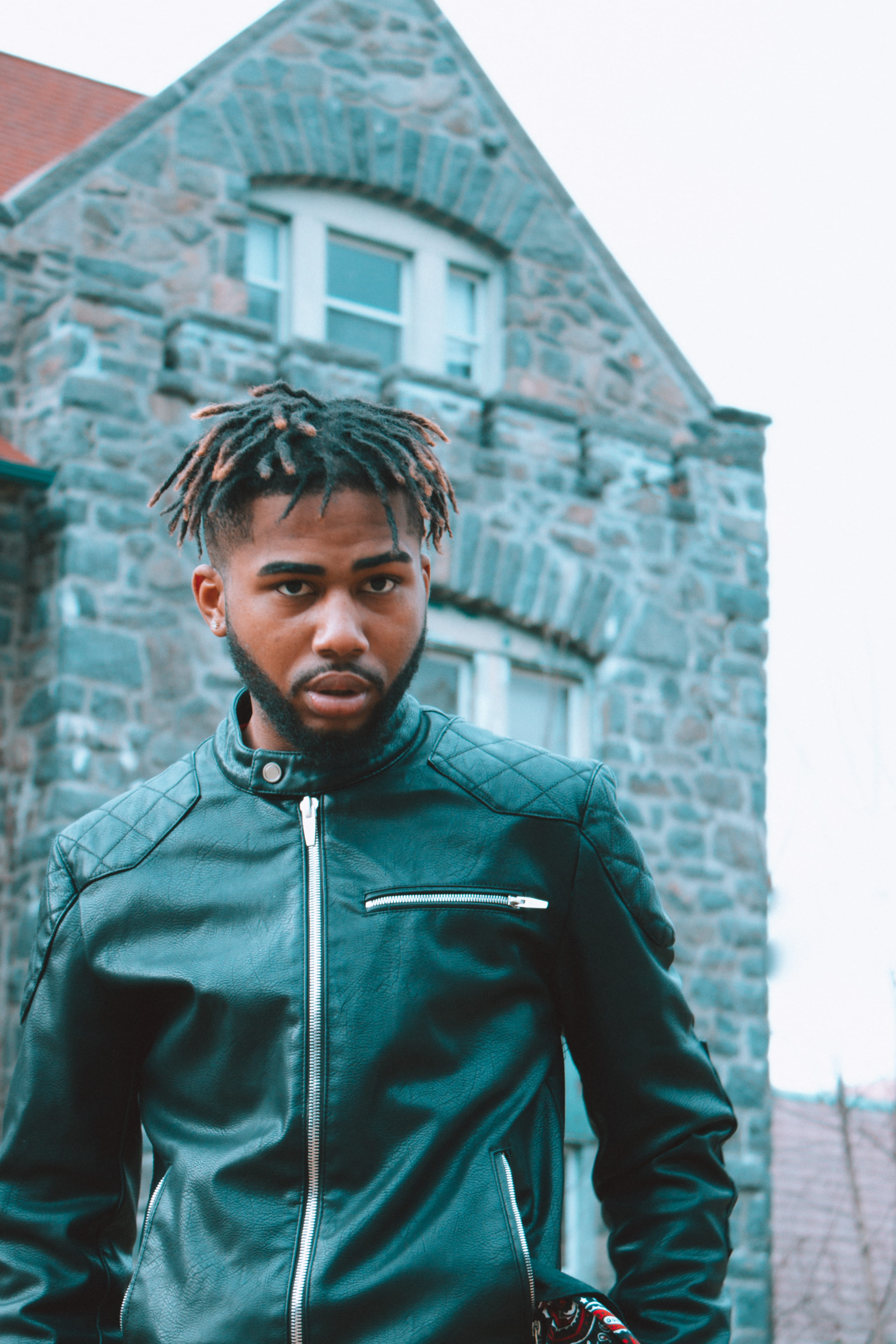 young men, young adult, men, portrait, zipper, warm clothing, leather, one person, standing, brick, rap, window, building exterior, website, fashion, architecture, Phone HD Wallpaper