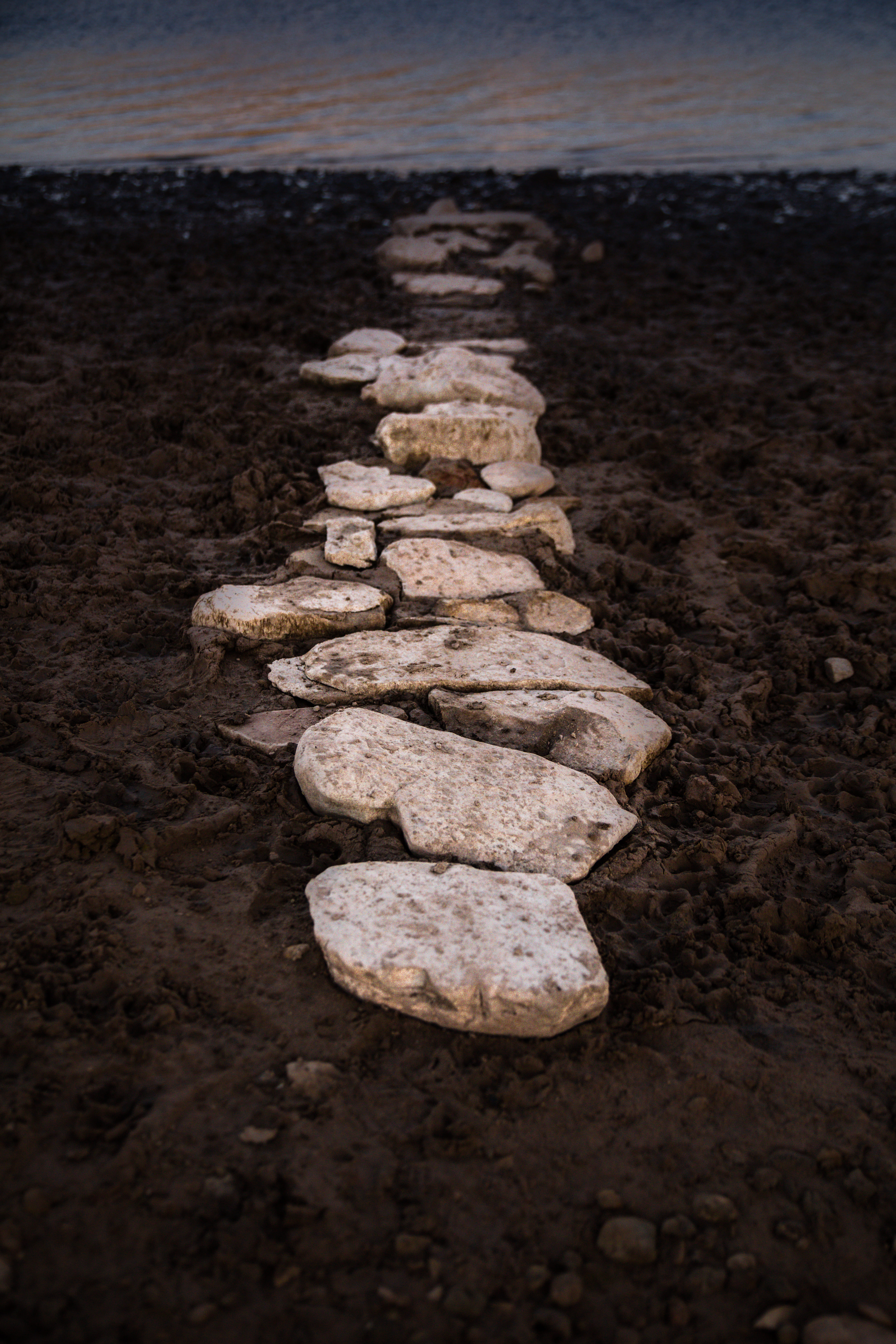 wilderness, beauty in nature, stone - object, sidewalk, beach, walkway, stones, high angle view, dirt road, shore, road, balance, sky, day, outdoors, pebble, Phone HD Wallpaper