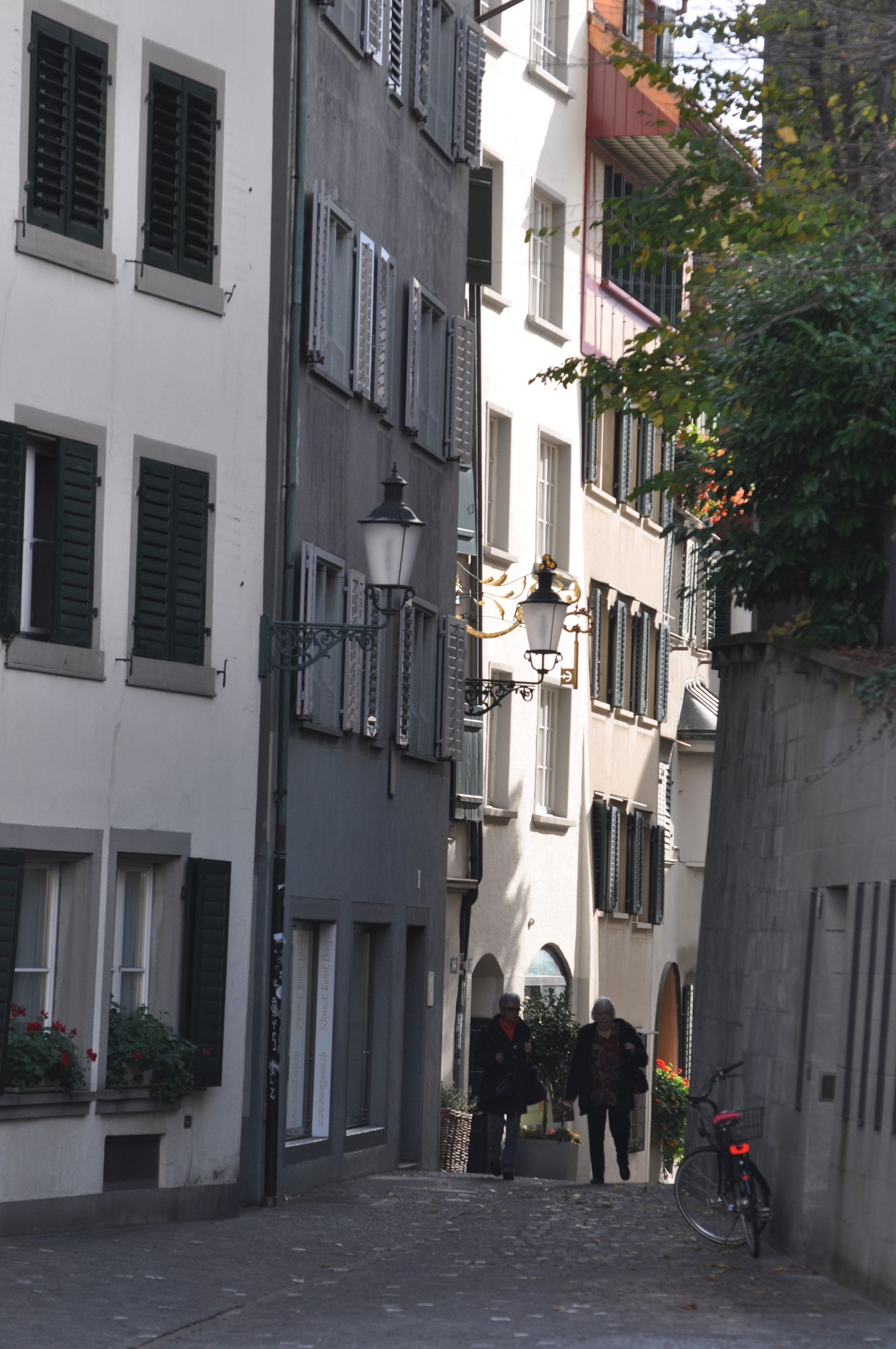 rear view, men, historic, real people, residential building, Zurich, walking, window, leisure activity, road, Old, building, cityscape, outdoors, town, Phone HD Wallpaper