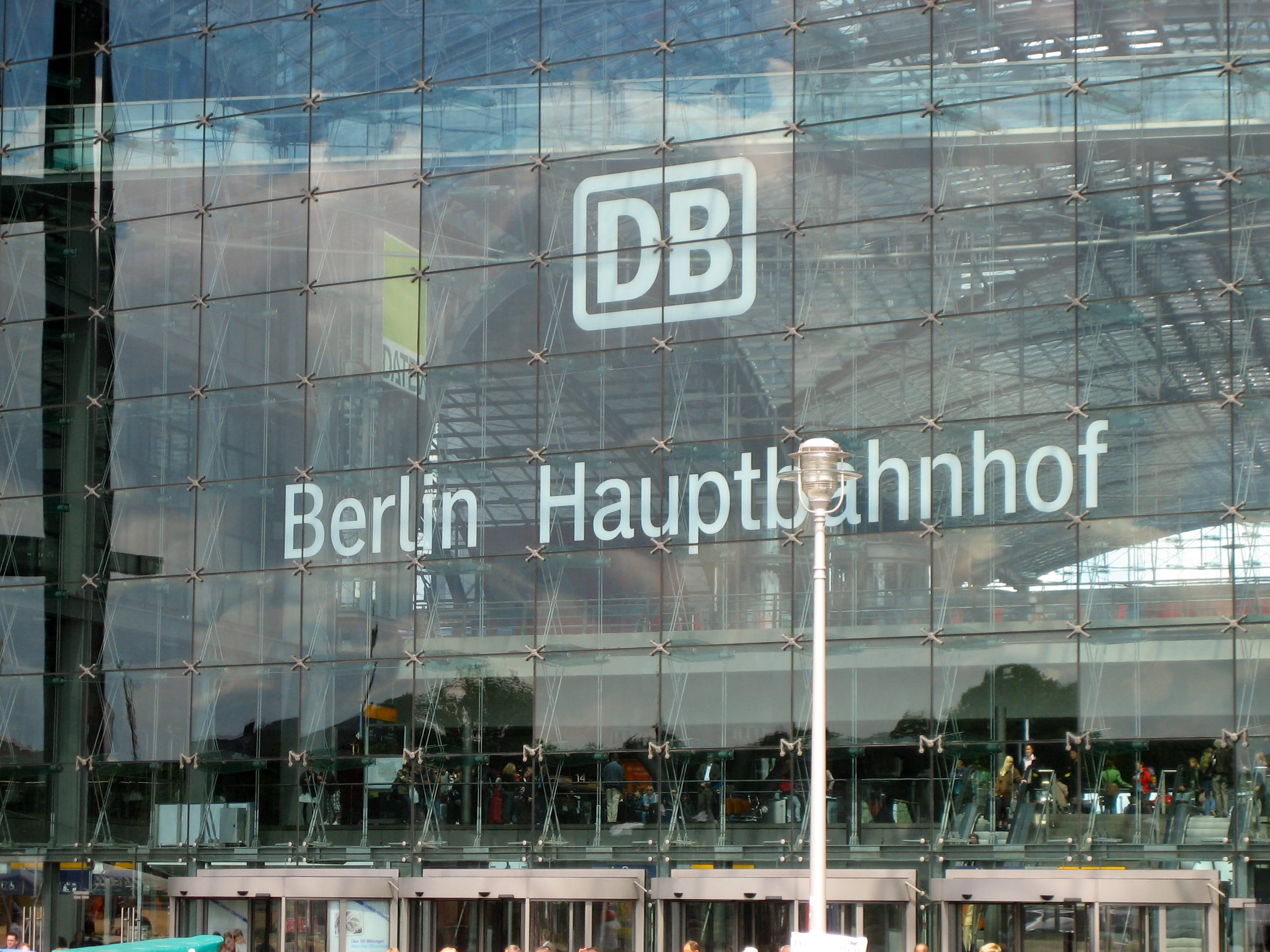 Berlin, building exterior, capital letter, western script, group of people, communication, window, airport, 2K, glass - material, outdoors, reflection, HD Wallpaper