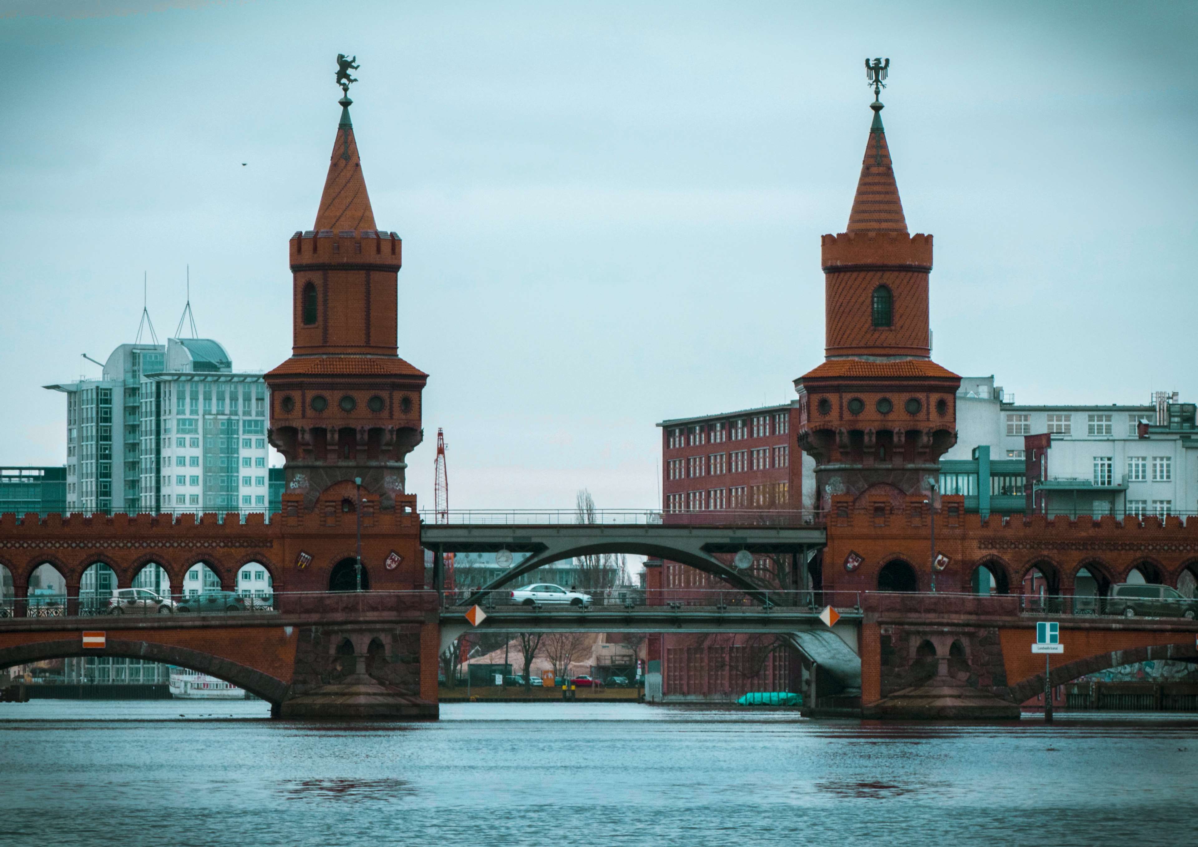 building, berlin, adobe photoshop, color, spire, architecture, river, water, bridge - man made structure, oberbaum, day, city, orange, connection, arch bridge, HD Wallpaper