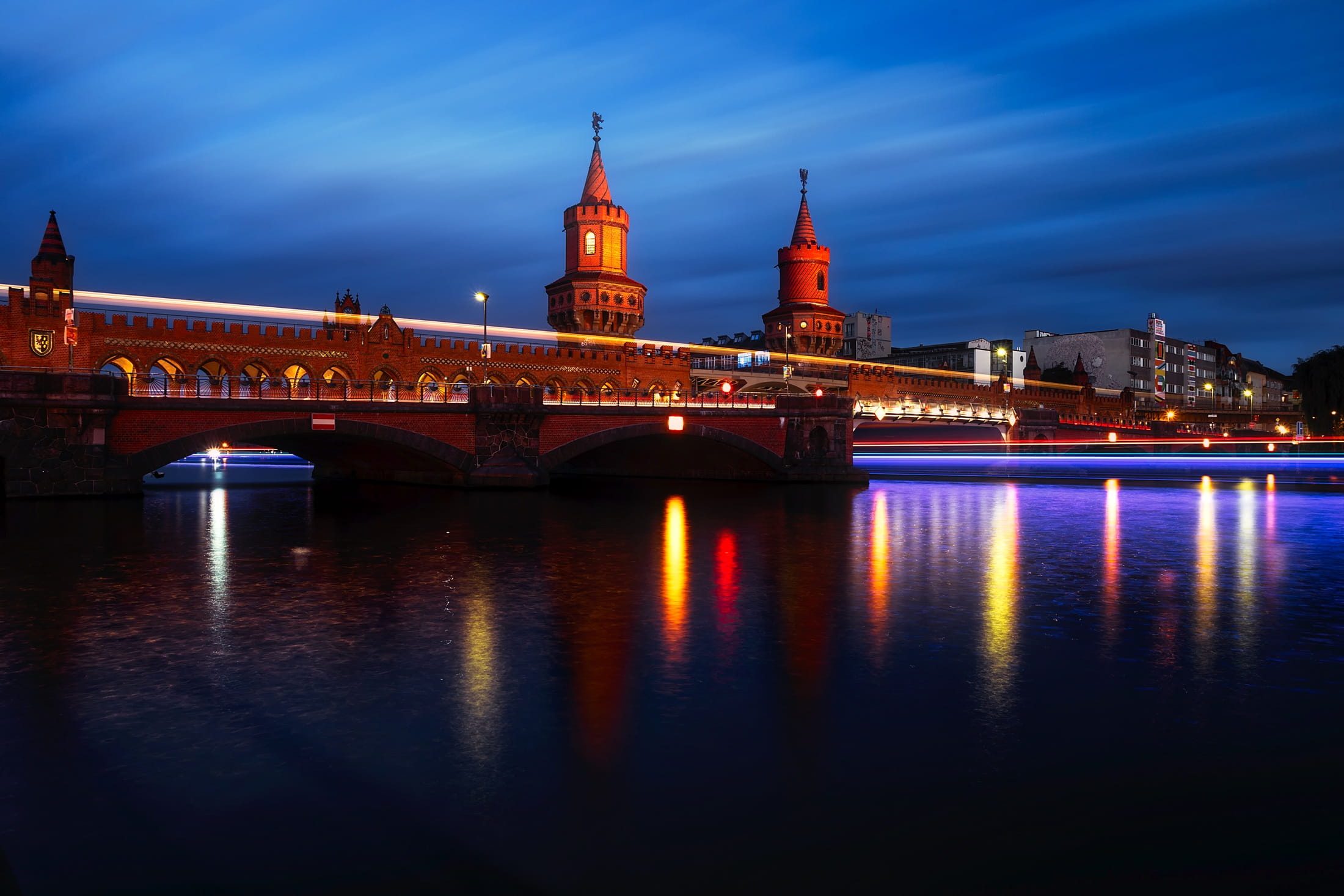 built structure, colorful, lights, buildings, architecture, glow, cityscape, river, cloud - sky, sunset, clouds, germany, outdoors, reflection, oberbaum bridge, HD Wallpaper