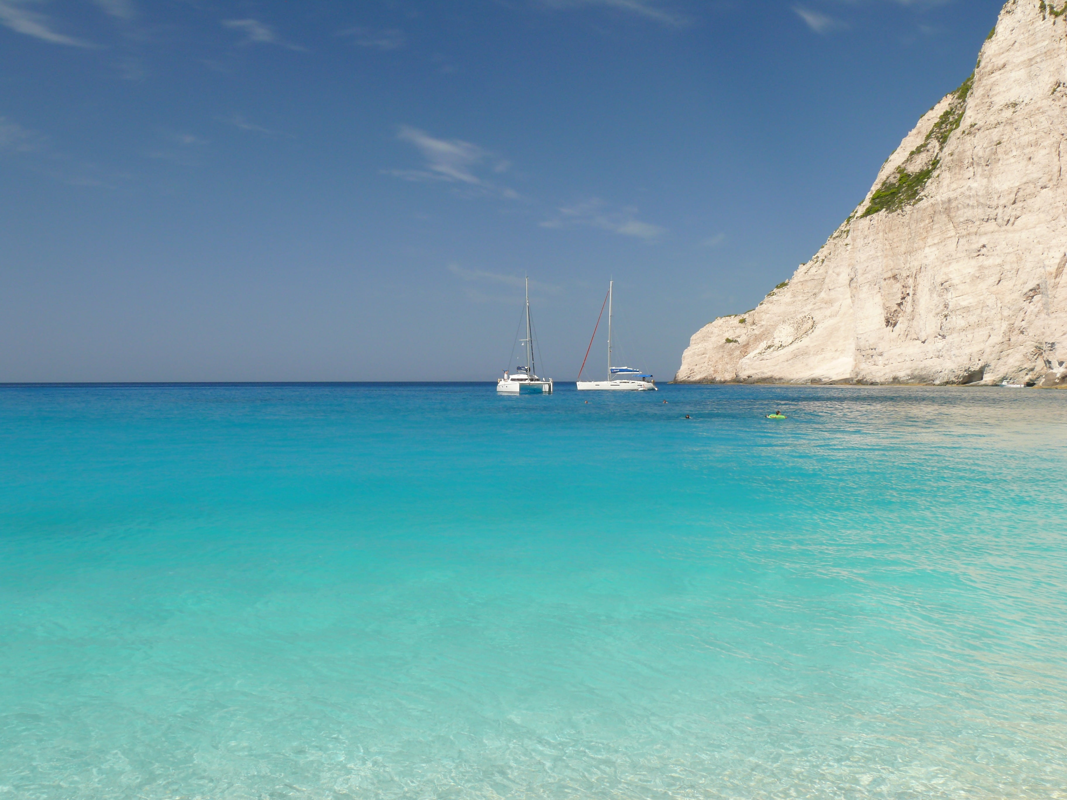 sailboat, transportation, tranquility, view, travel, tranquil, summer, mountain, two, sea, white, sky, horizon, 2K, relaxation, clouds, vacations, shoreline, HD Wallpaper