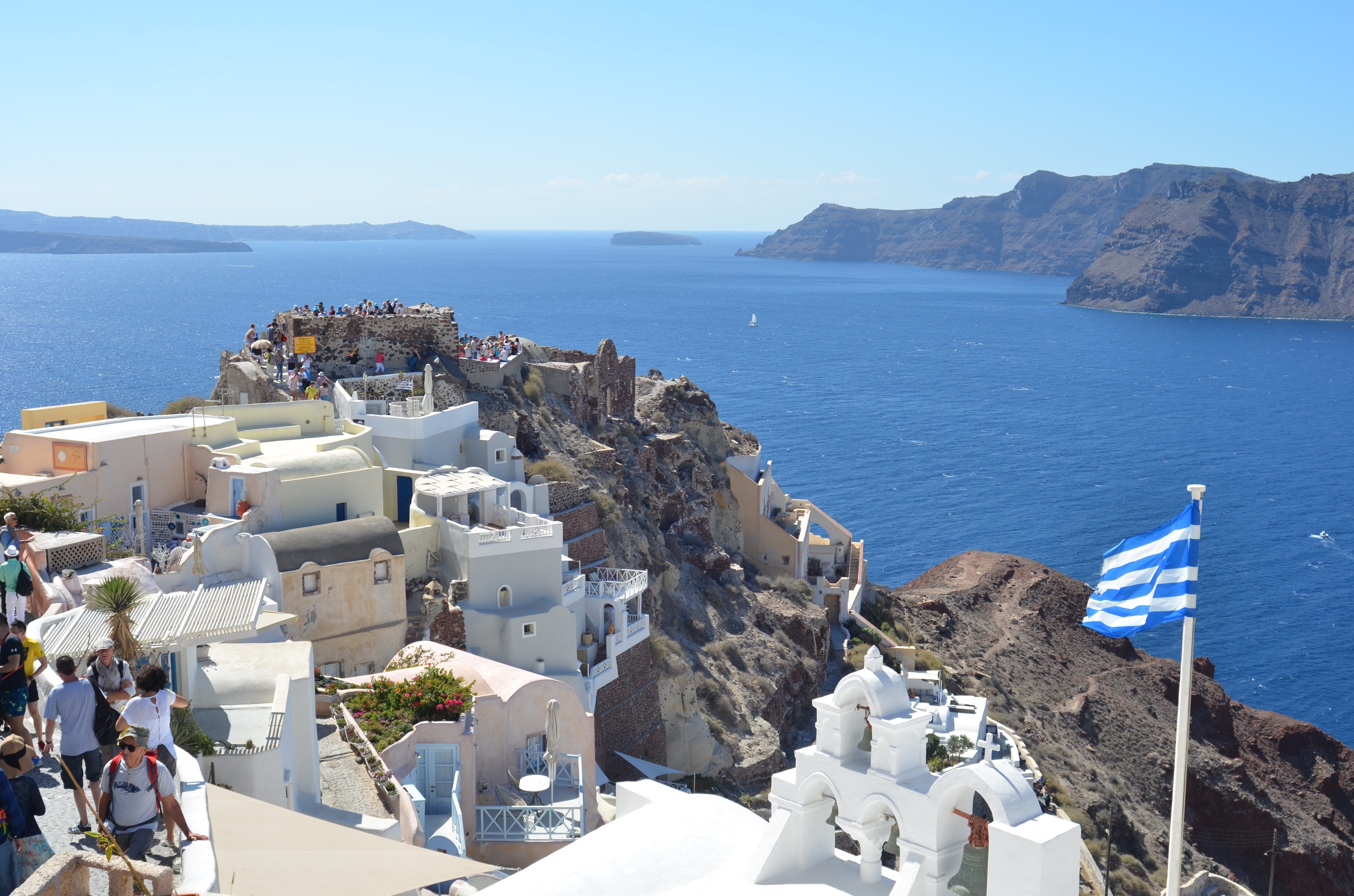 sea, 4K, water, santorini, horizon over water, architecture, town, greek flag, tourism, high angle view, building, blue, summer, sky, built structure, HD Wallpaper