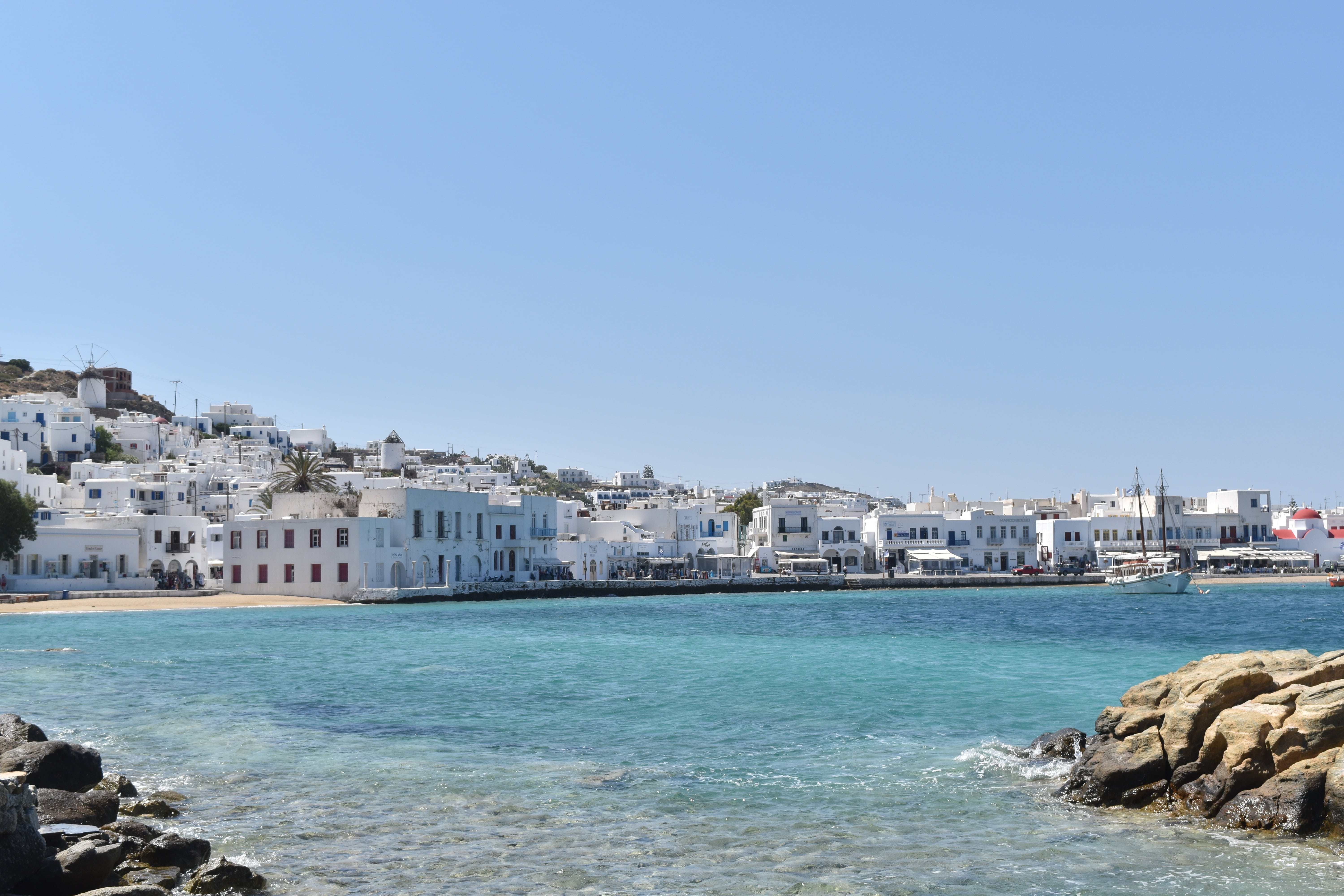 building, building exterior, architecture, beach, mykonos, water, cityscape, beside, day, travel destinations, sea, no people, built structure, 5K, nature, HD Wallpaper