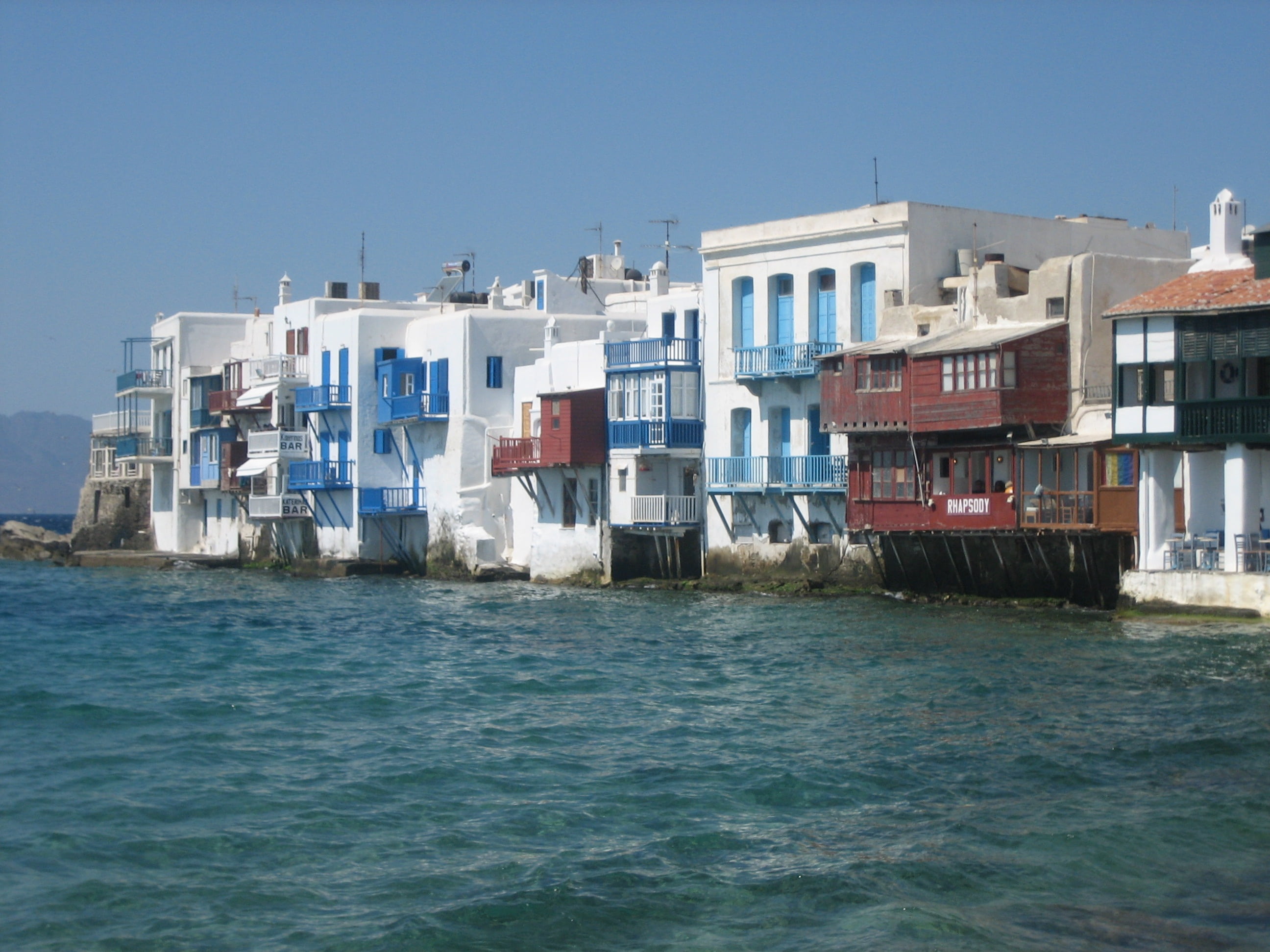 water, built structure, day, sunlight, blue, clear sky, outdoors, no people, city, sea, cyclades, 2K, luxury, building, sky, architecture, greek island, HD Wallpaper