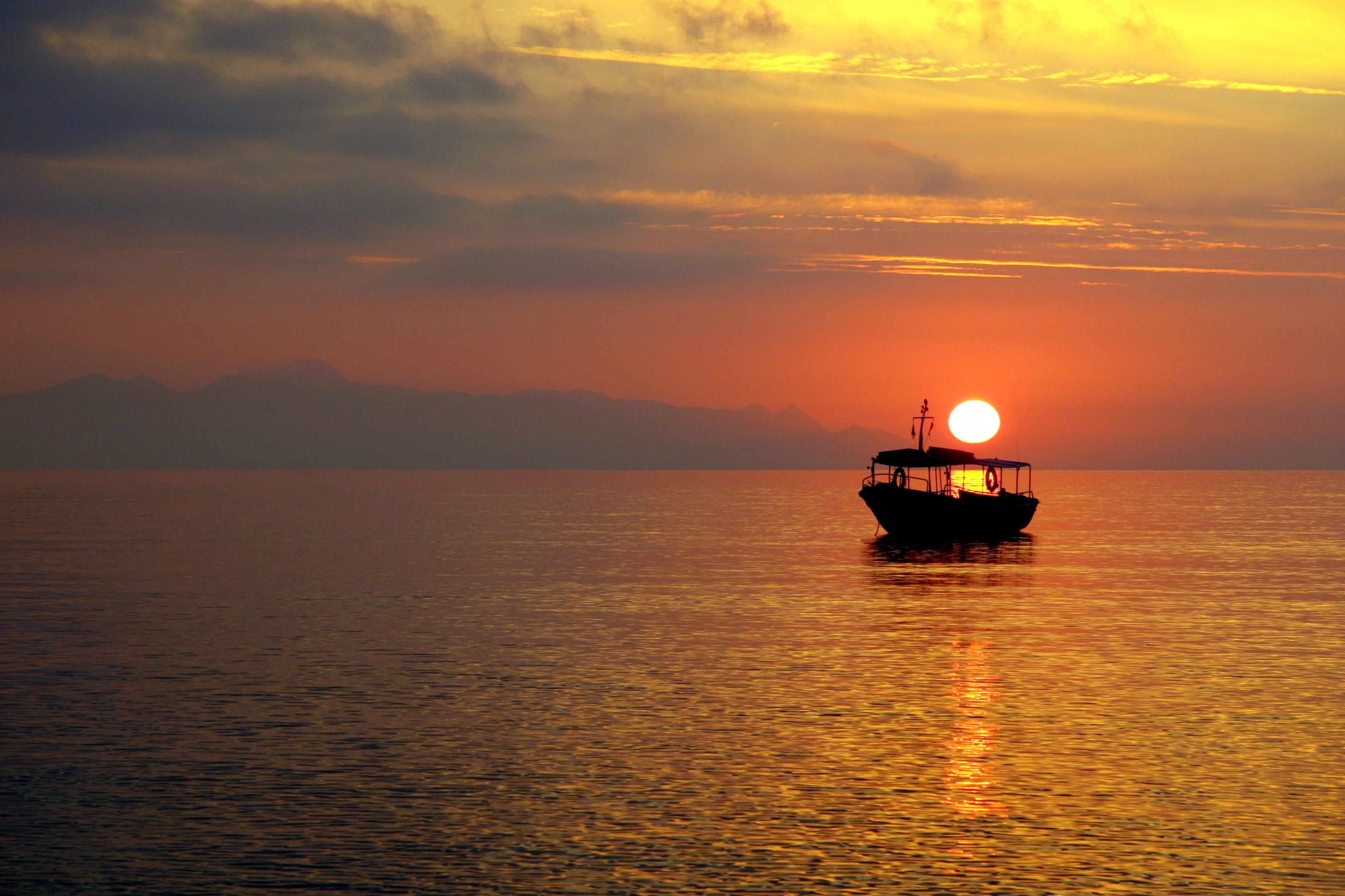 mood, nature, reflection, sunrise, caldera, boat, scenics - nature, volcanic, santorini, facing, orange color, cyclades, sunset, body, tranquil scene, horizon, HD Wallpaper