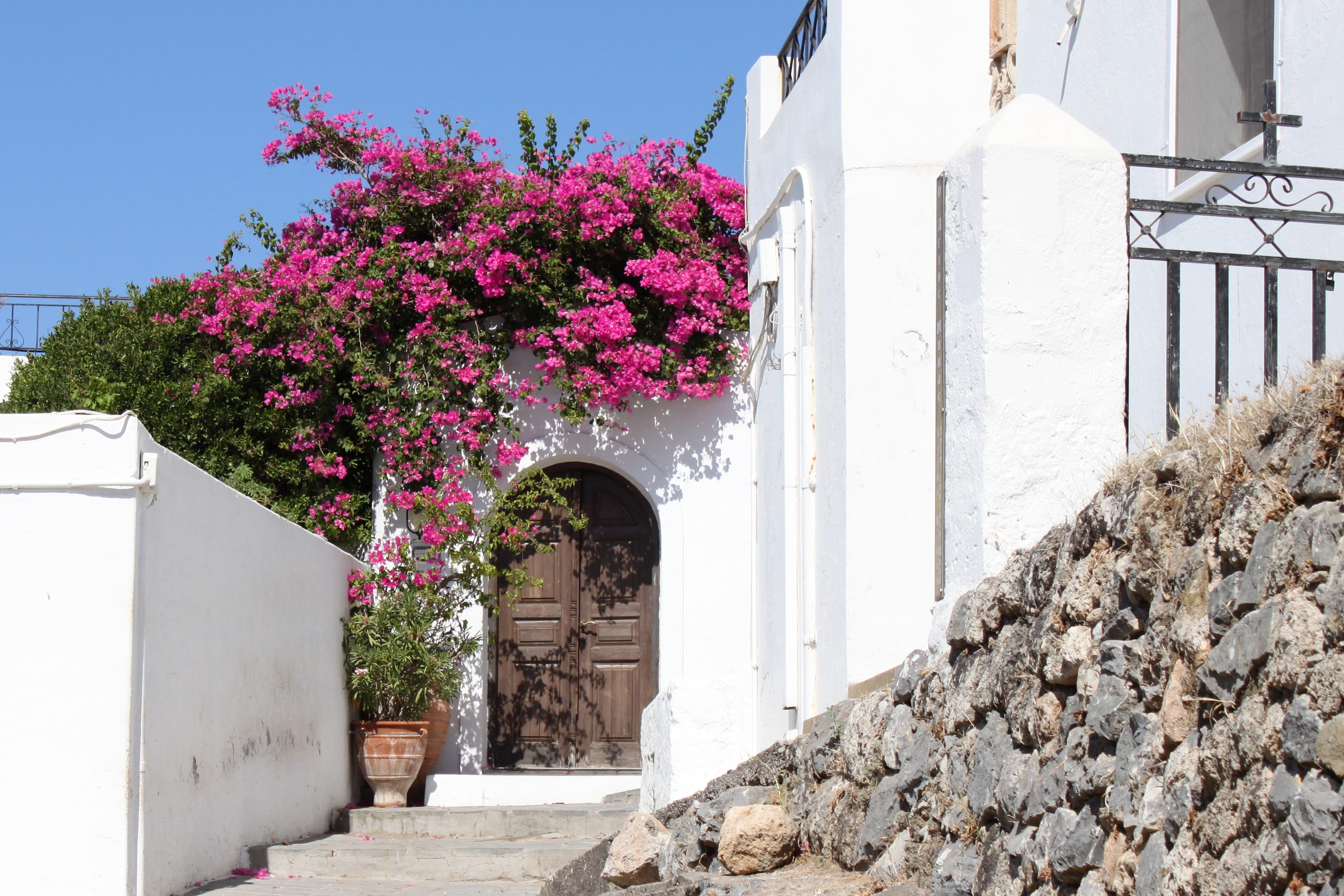 sky, nature, flowering plant, pots, rhodes, Greece, Port, stone wall, purple, Flowers, entrance, 2K, day, house, mediterranean Countries, architecture And Buildings, HD Wallpaper