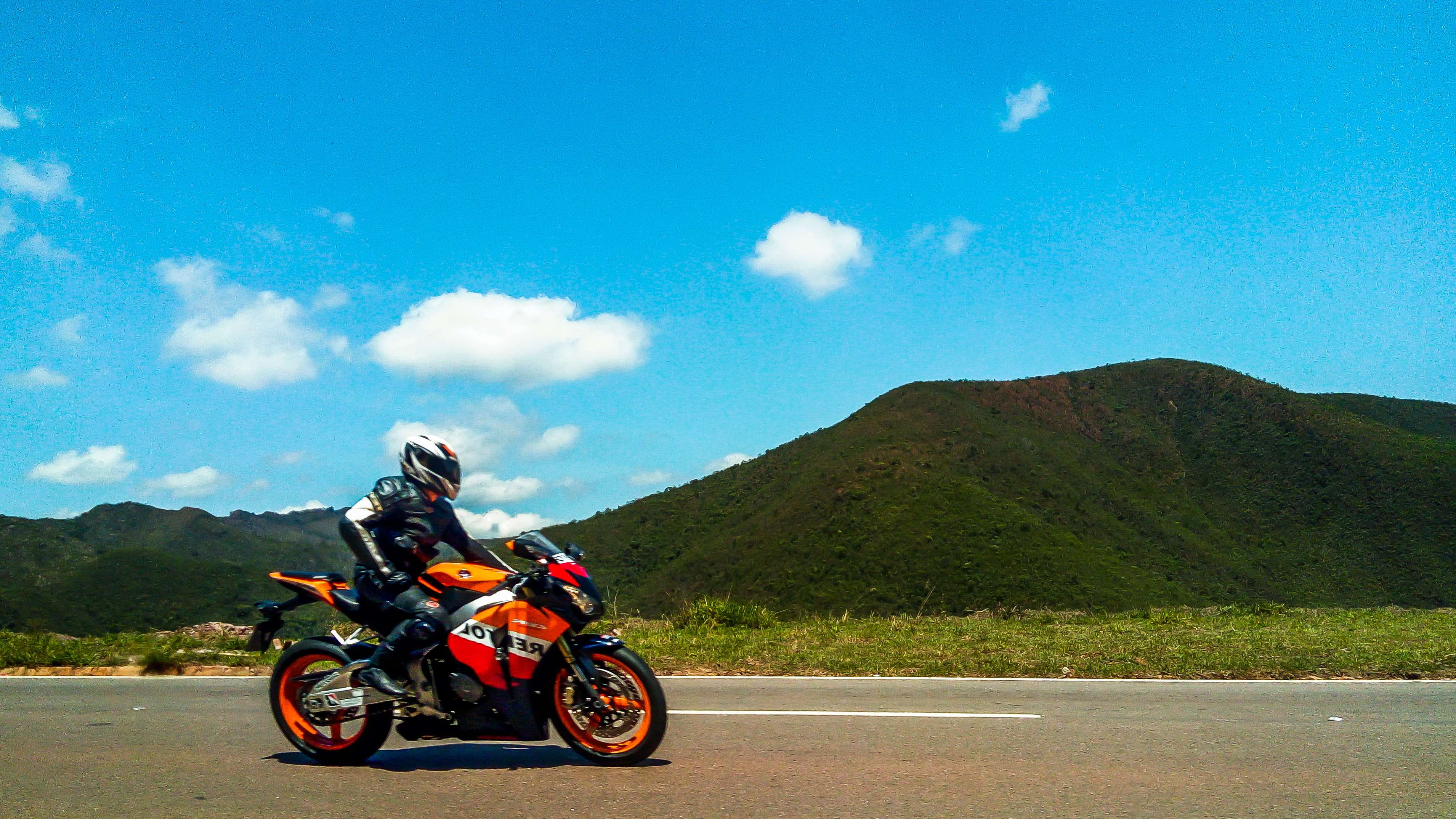 brazil, sports helmet, one person, mode of transportation, day, helmet, mountain, crash helmet, sky, motorcycle, blue sky, travel, blue, road, 2K, cloud - sky, HD Wallpaper