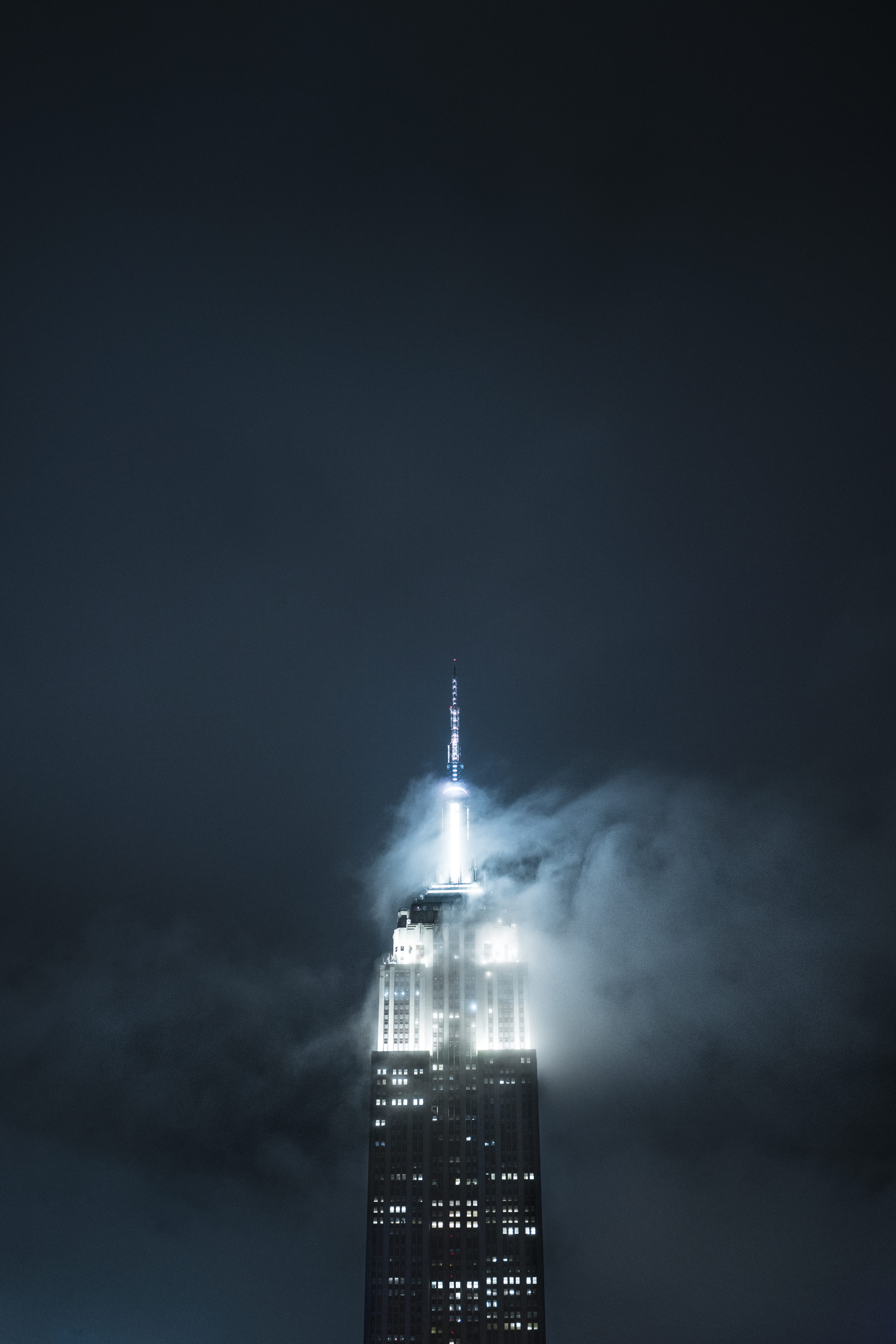 mist, lighted, communication, cityscape, mystic, minimal, 5K, rise, spire, illuminated, skyscraper, nature, building exterior, nighttime, empire state building, Phone HD Wallpaper