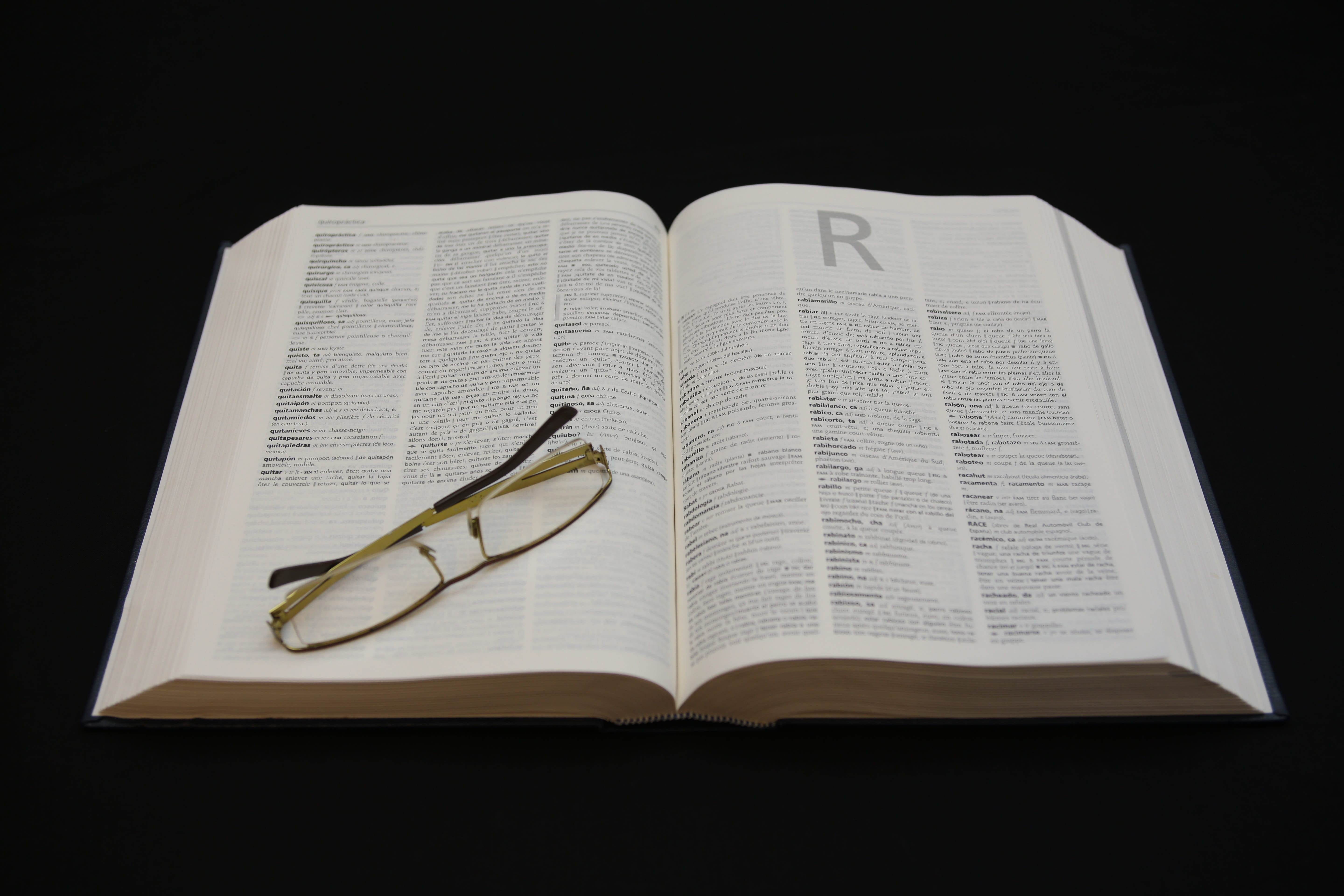 glasses, education, paper, no people, yellow, learning, close-up, text, framed, arts culture and entertainment, book, Bezel, open, black background, top, HD Wallpaper