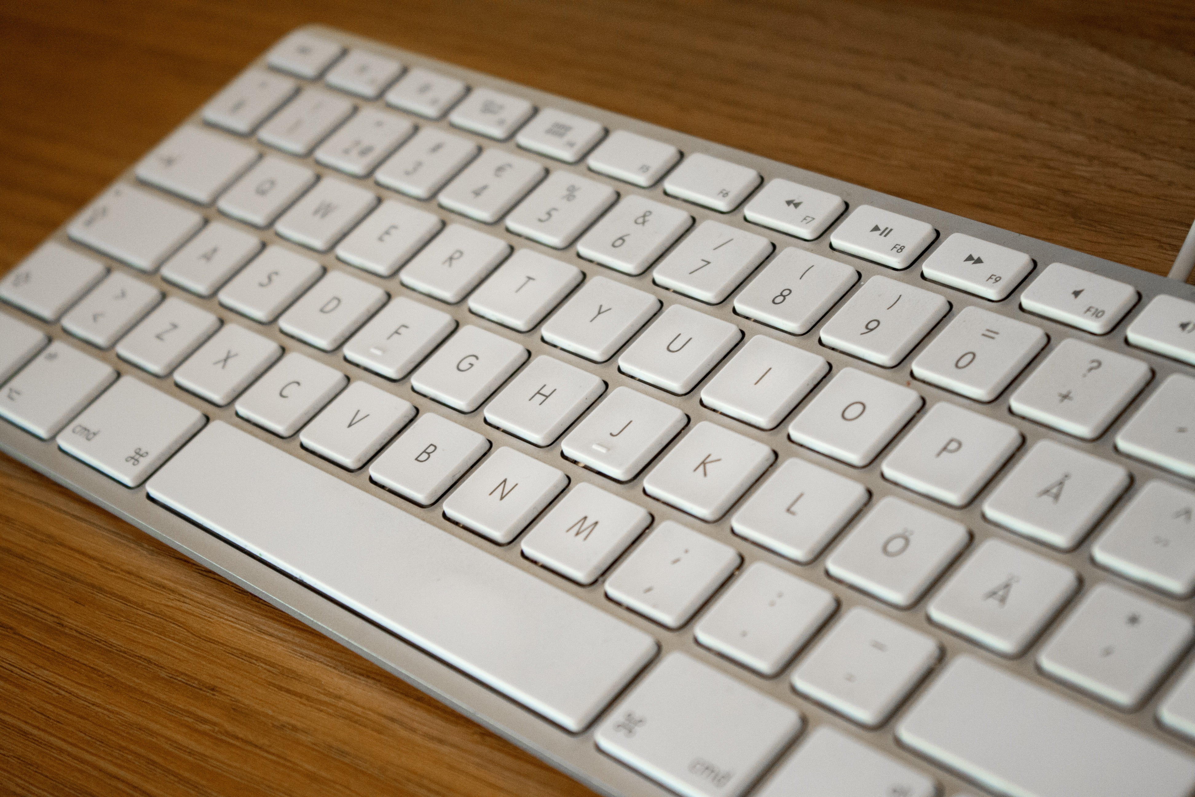 no people, focus on foreground, selective focus, electronics, surface, computer equipment, letter, brown, indoors, computer part, apple, keyboard, computer Keyboard, HD Wallpaper