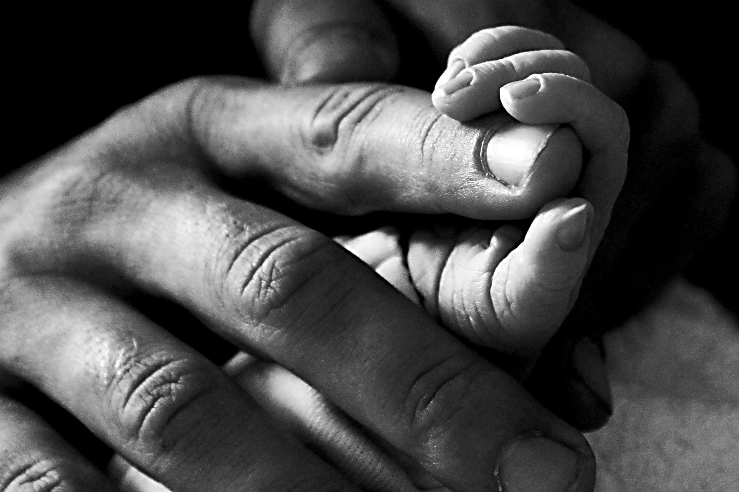 protection, handyman, finger, son, hands, baby, black, child, helpless, grayscale, nail, beauty, human hand, babyhood, care, body part, fraternal, people, HD Wallpaper