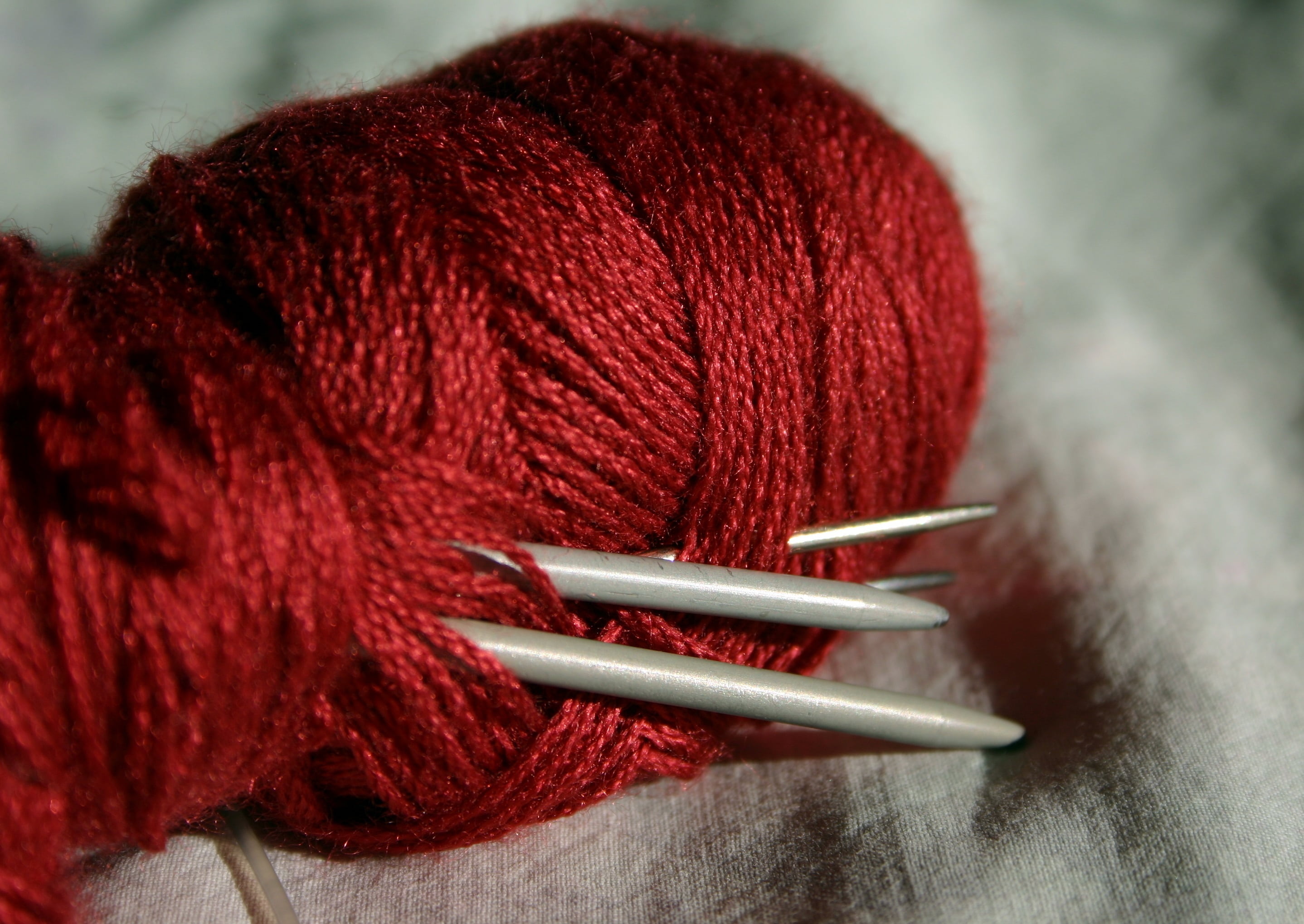 sewing, softness, studio shot, red, 2K, sewing Item, ball of wool, yarn, clothing, soft, knitting, material, needles, knit, knitting needle, cats cradle, HD Wallpaper
