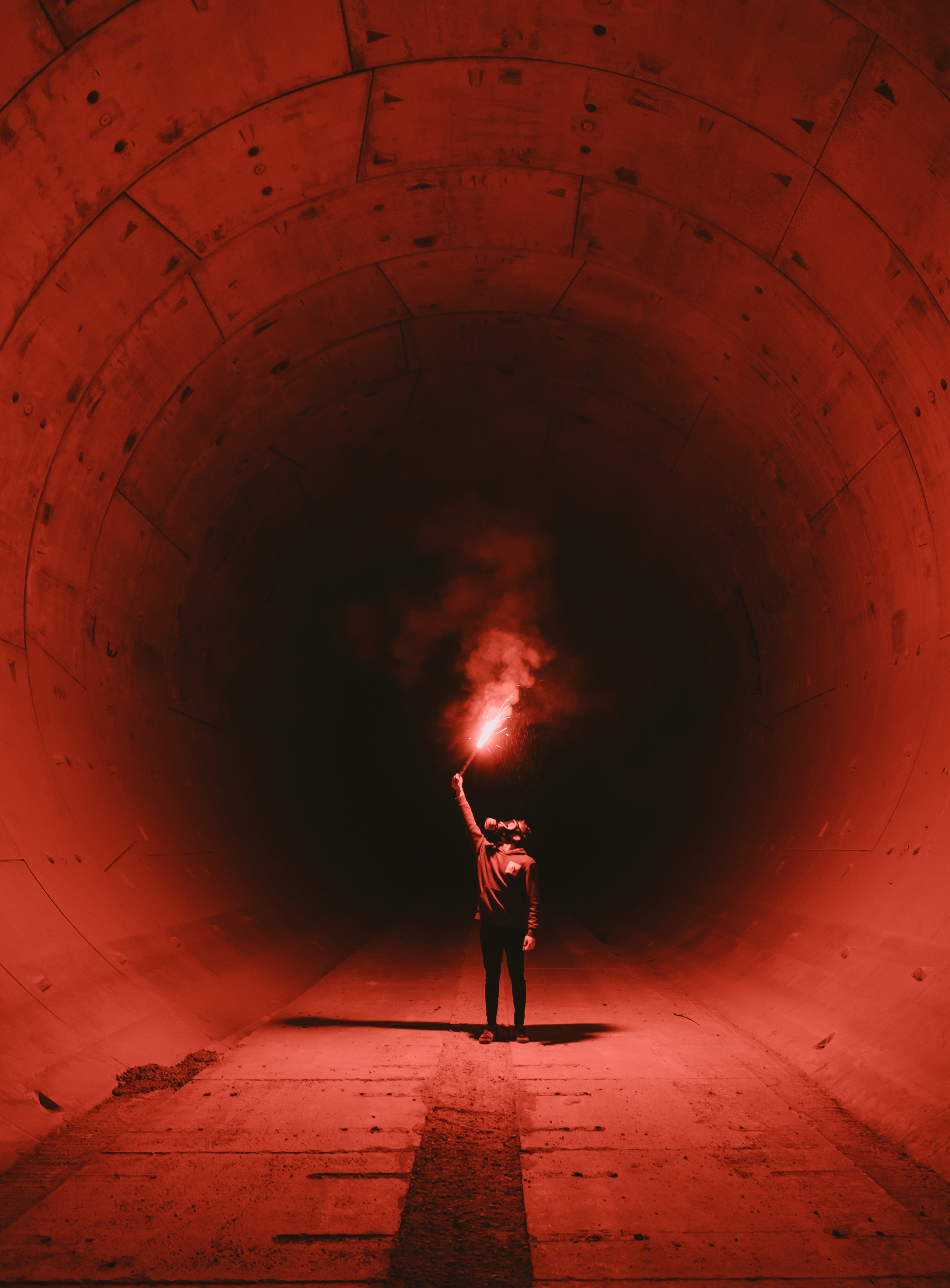 full length, adult, red, illuminated, tunnel, man, rear view, human limb, limb, gas mask, architecture, night, dark, fire, light, black, shirt, arms raised, Phone HD Wallpaper
