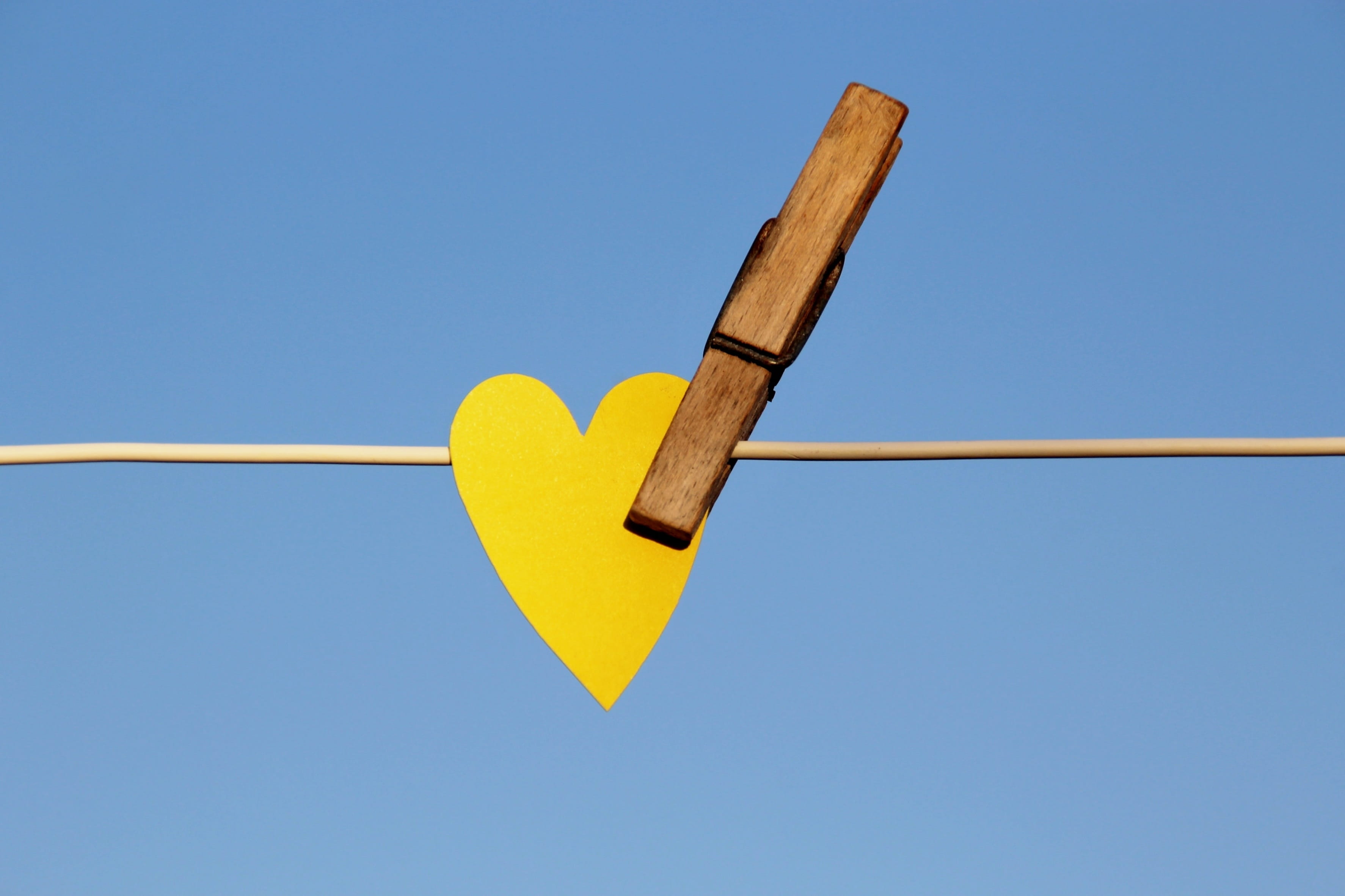 blue background, wood - material, laundry, love, suspended, arrow - bow and arrow, sky, close-up, work tool, document, rope, summer, yellow, clothes peg, HD Wallpaper
