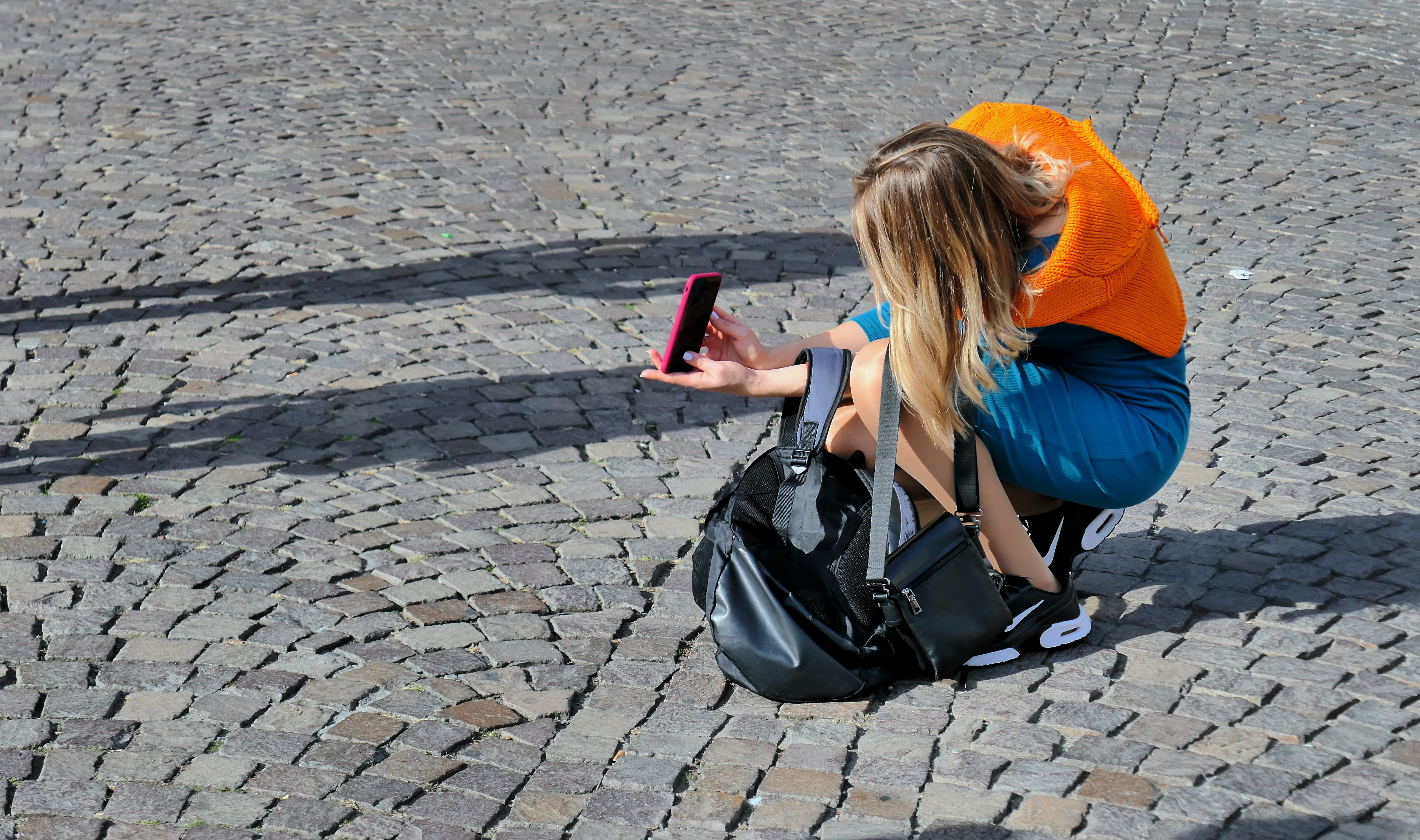 communication, summer, person, hair, outdoors, wireless technology, long hair, cobblestone, sitting, hairstyle, nature, one person, anonymous, women, casual clothing, HD Wallpaper