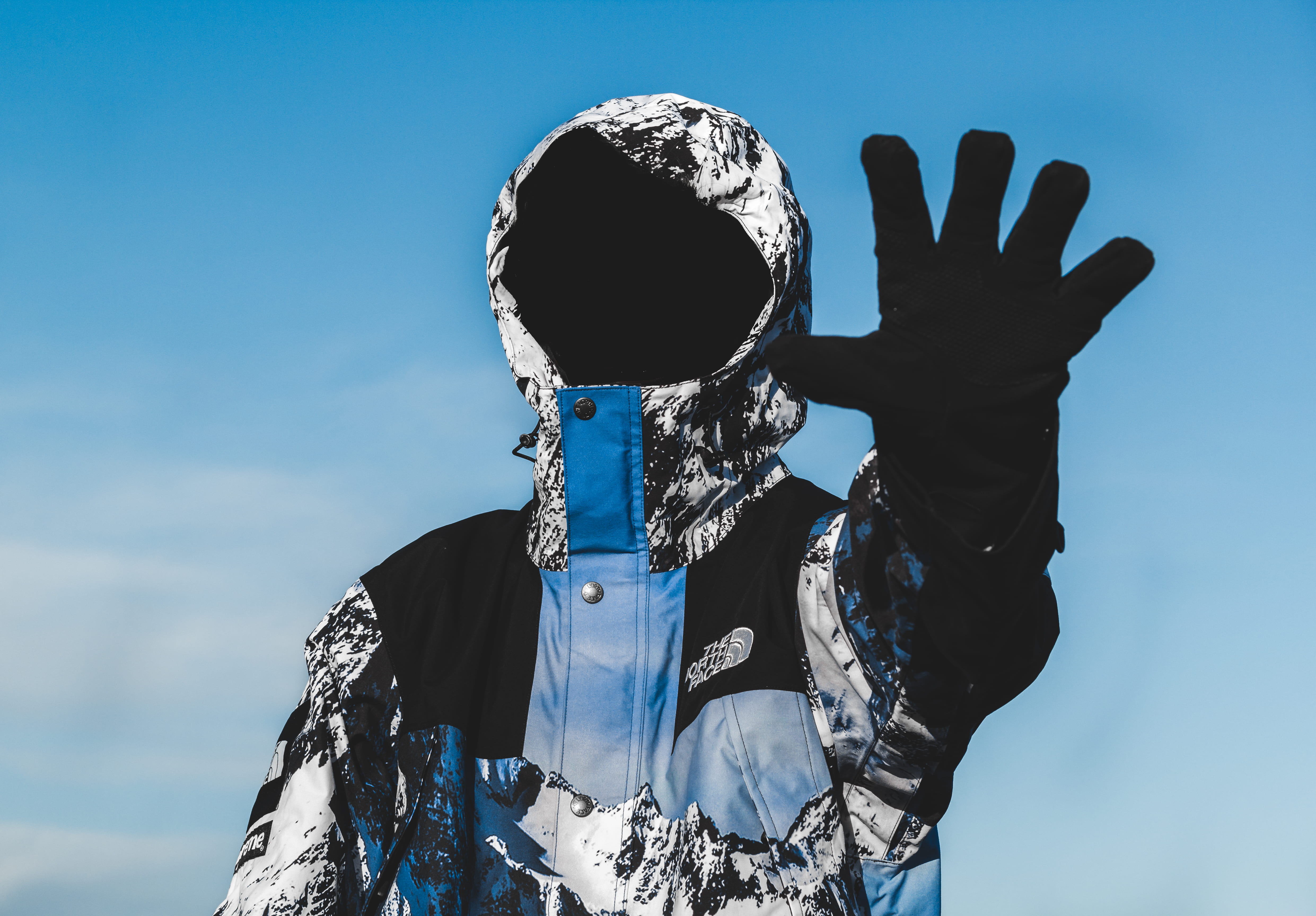 glove, unrecognizable person, standing, one person, sunlight, coat, real people, outdoors, hairstyle, rear view, raising, wearing, hand, left, button, hoodie, HD Wallpaper