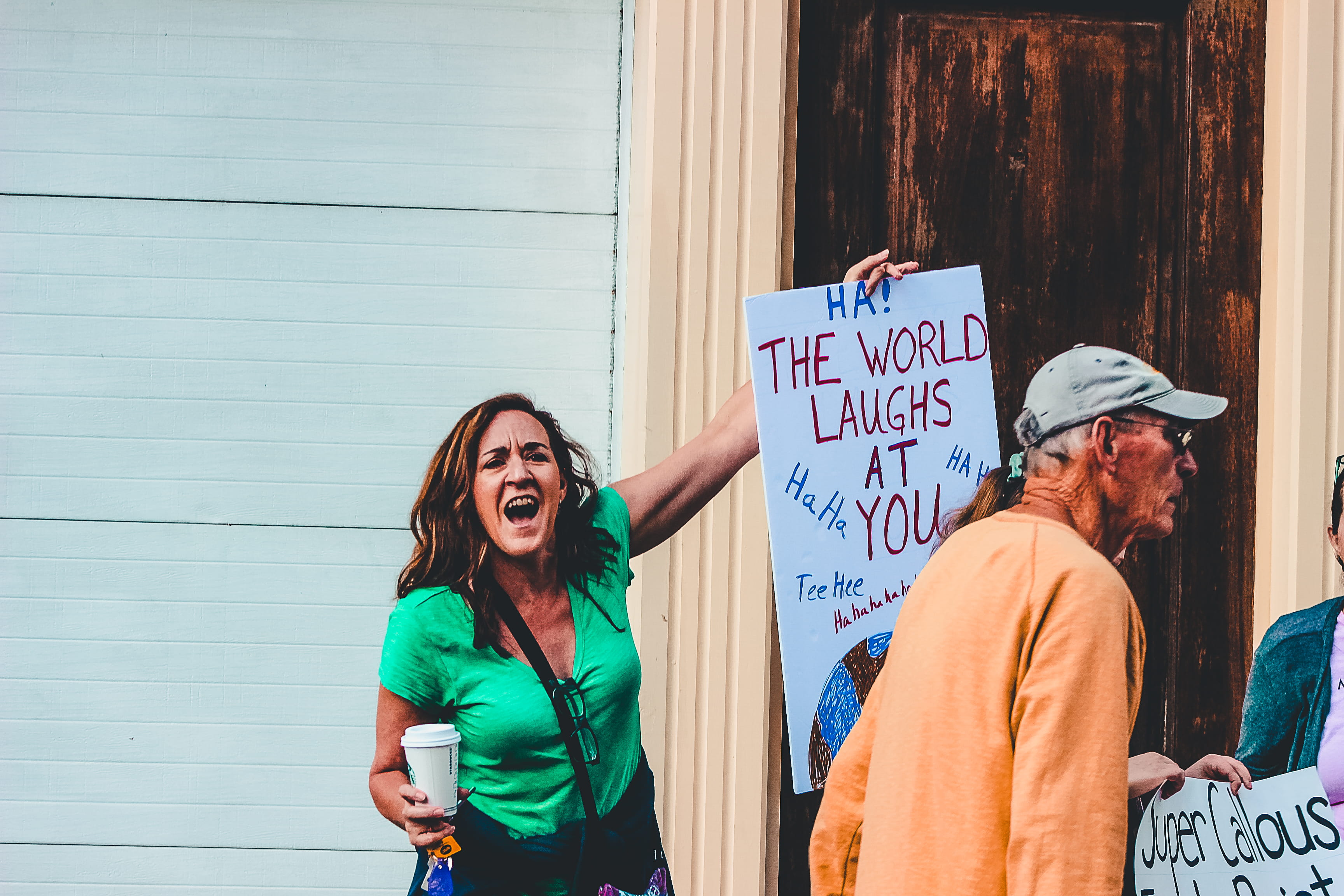 laughs, lifestyles, building exterior, young adult, day, casual clothing, 2K, protest, man, real people, woman, crowd, daytime, world, standing, street, HD Wallpaper
