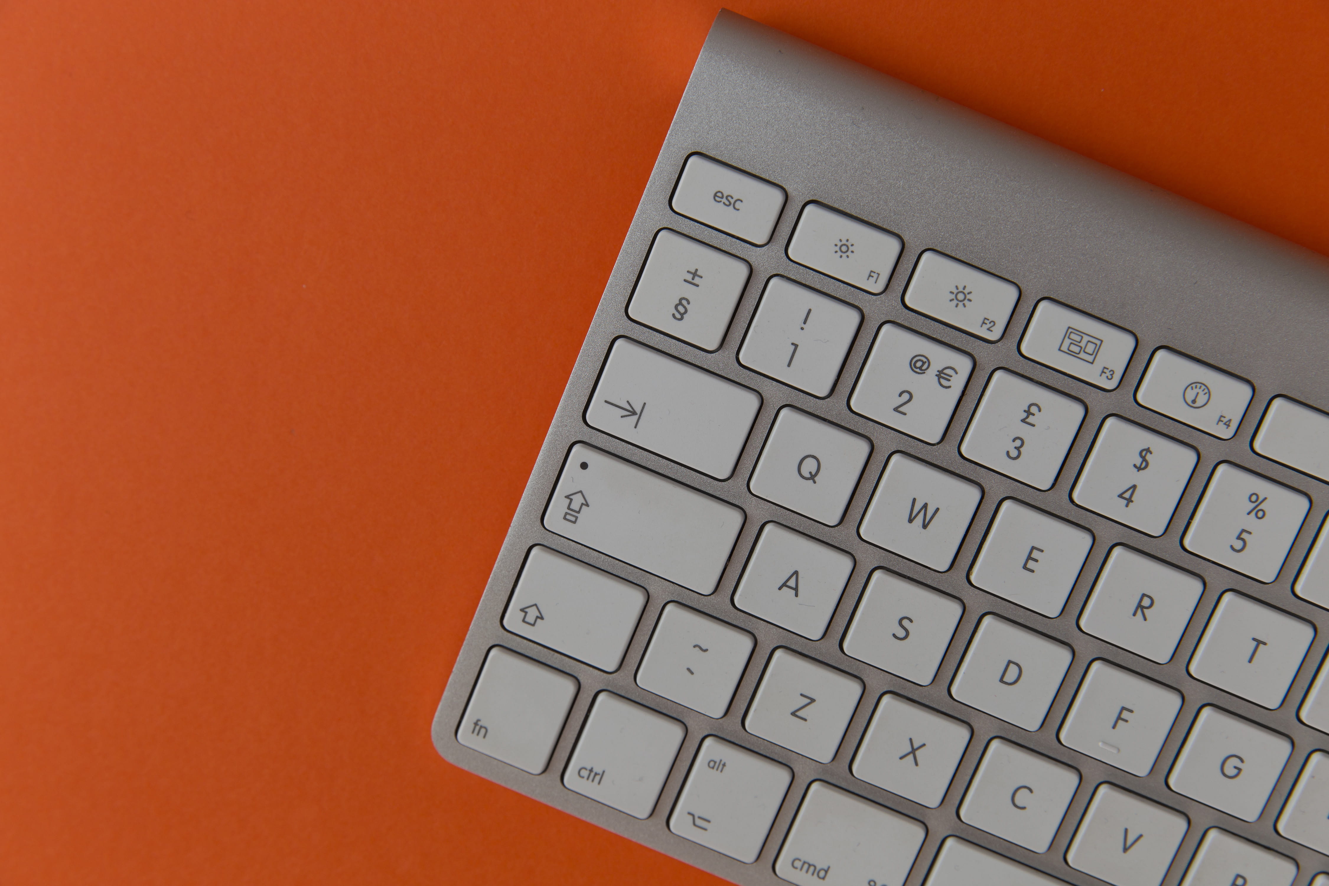 keyboard, indoors, wireless technology, 4K, background, orange, communication, laptop, colored background, Apple, computer Key, equipment, computer, letter, HD Wallpaper