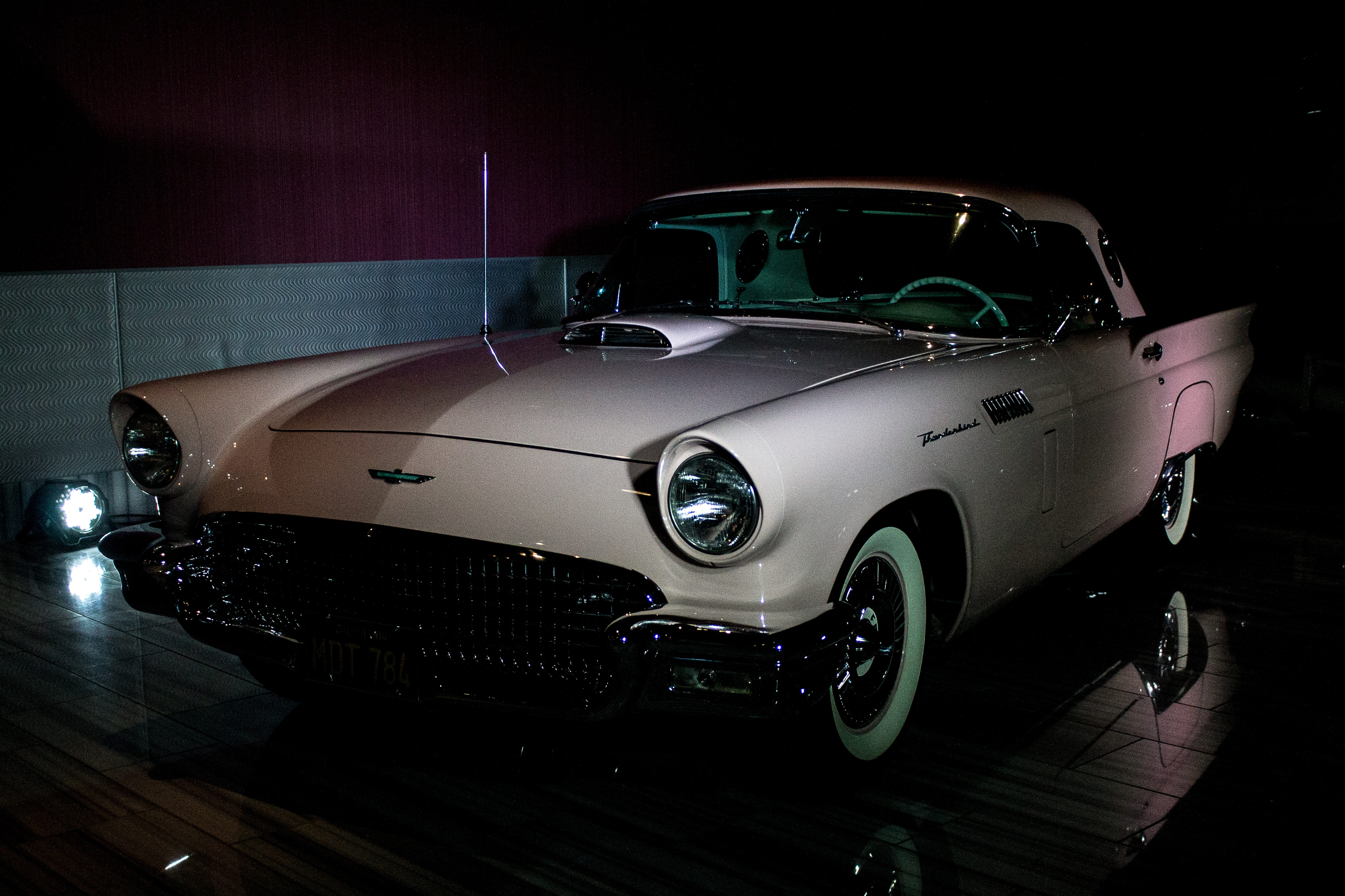 illuminated, stationary, man, garage, metal, sky, silver colored, headlight, design, buy, motor vehicle, automotive, business, vehicle, 5K, people, vintage car, HD Wallpaper