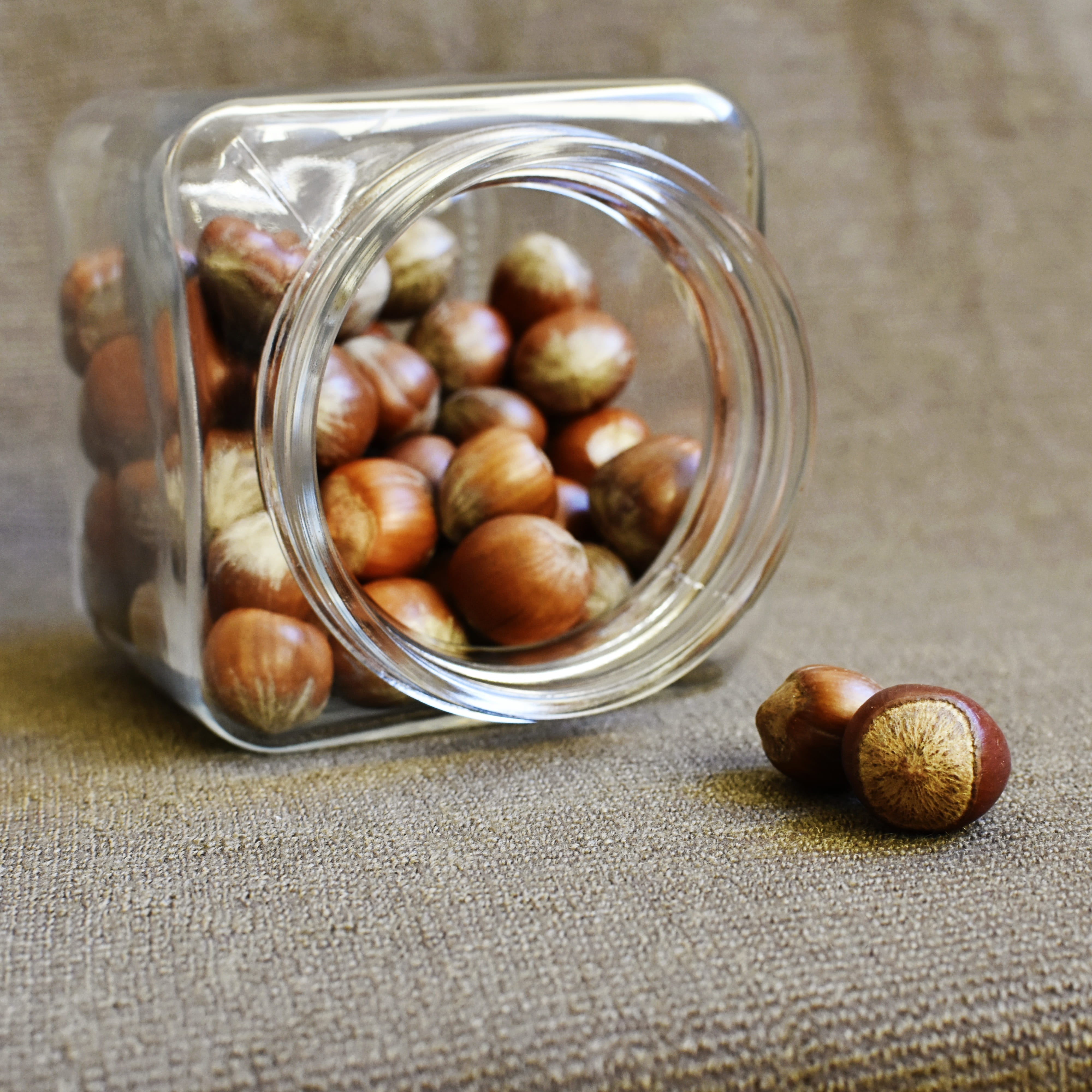 high angle view, vitamins source, table, brown, nutrition, glass - material, close-up, hazelnuts, food and drink, healthy, gaining weight, freshness, hazelnut fruit, Phone HD Wallpaper
