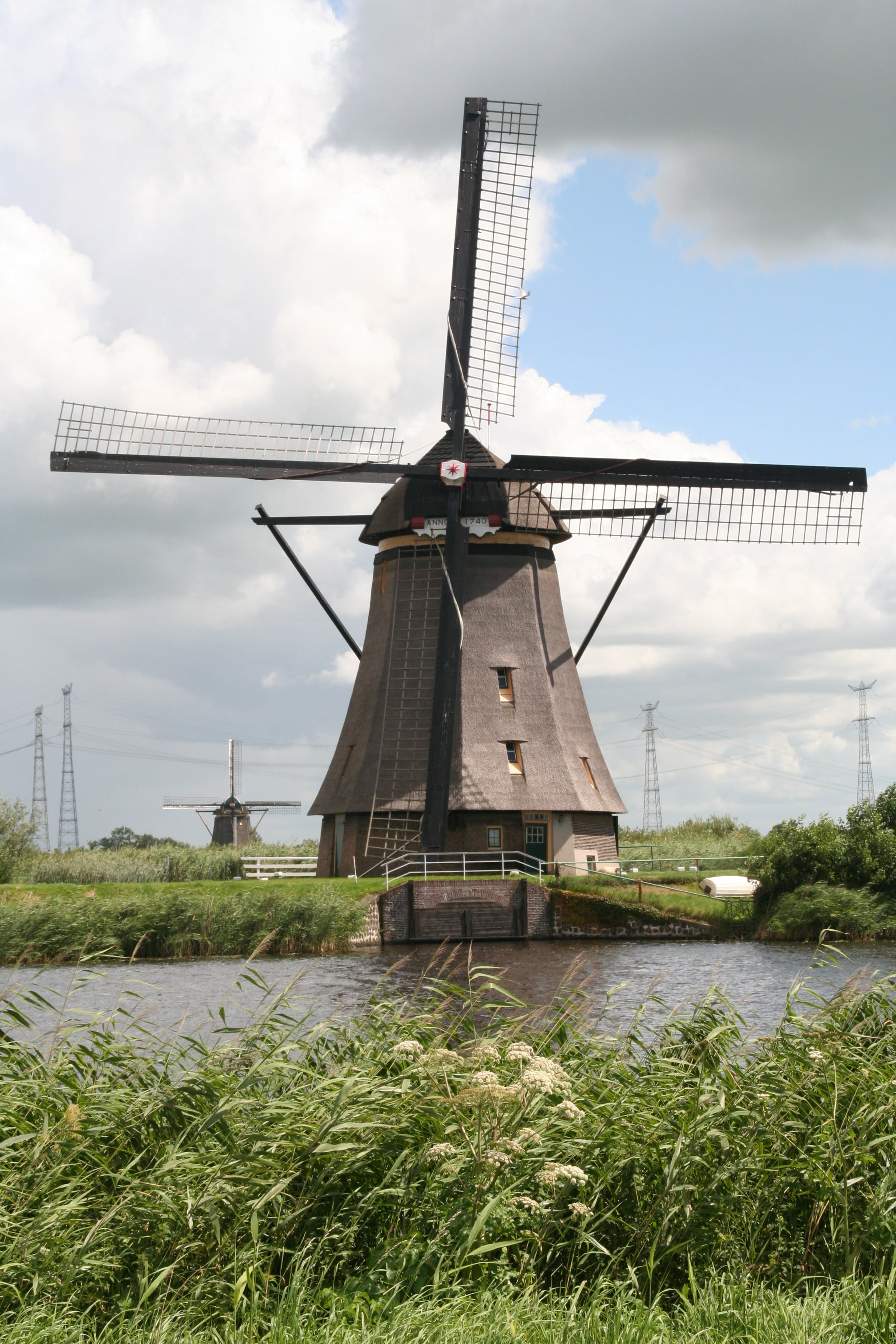 mill, sky, built structure, grass, field, land, plant, renewable energy, wind power, wicks, windmill, architecture, day, landscape, alternative energy, Phone HD Wallpaper