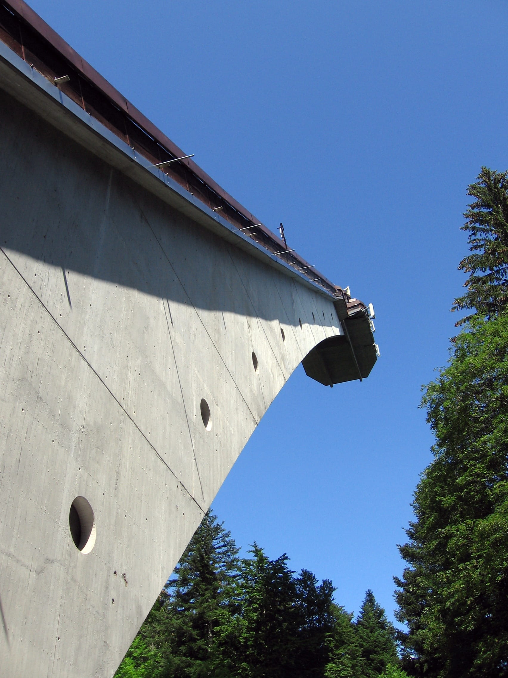 concrete, built structure, tree, growth, blue, plant, Ski Jump, Oberstdorf, city, Hill, building exterior, low angle view, outdoors, sunlight, roof, 1080P, Phone HD Wallpaper