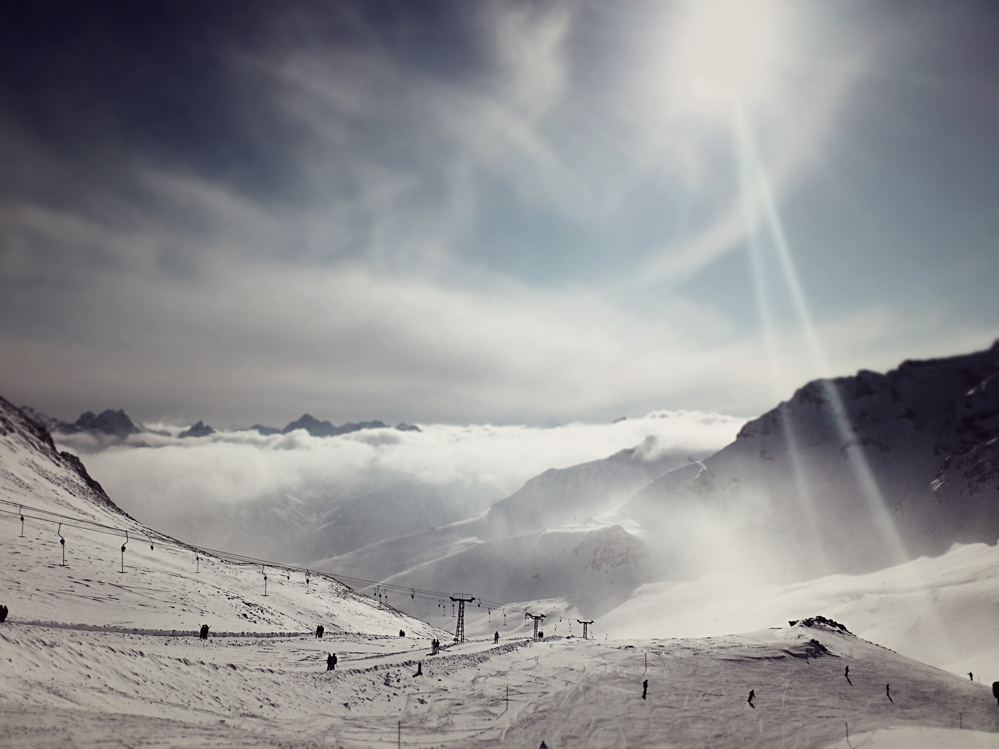 cold temperature, mountain, clouds, slope, skiing, bright, nature, lens flare, sun, mountain range, 2K, tranquil scene, snowboarding, holiday, white color, HD Wallpaper