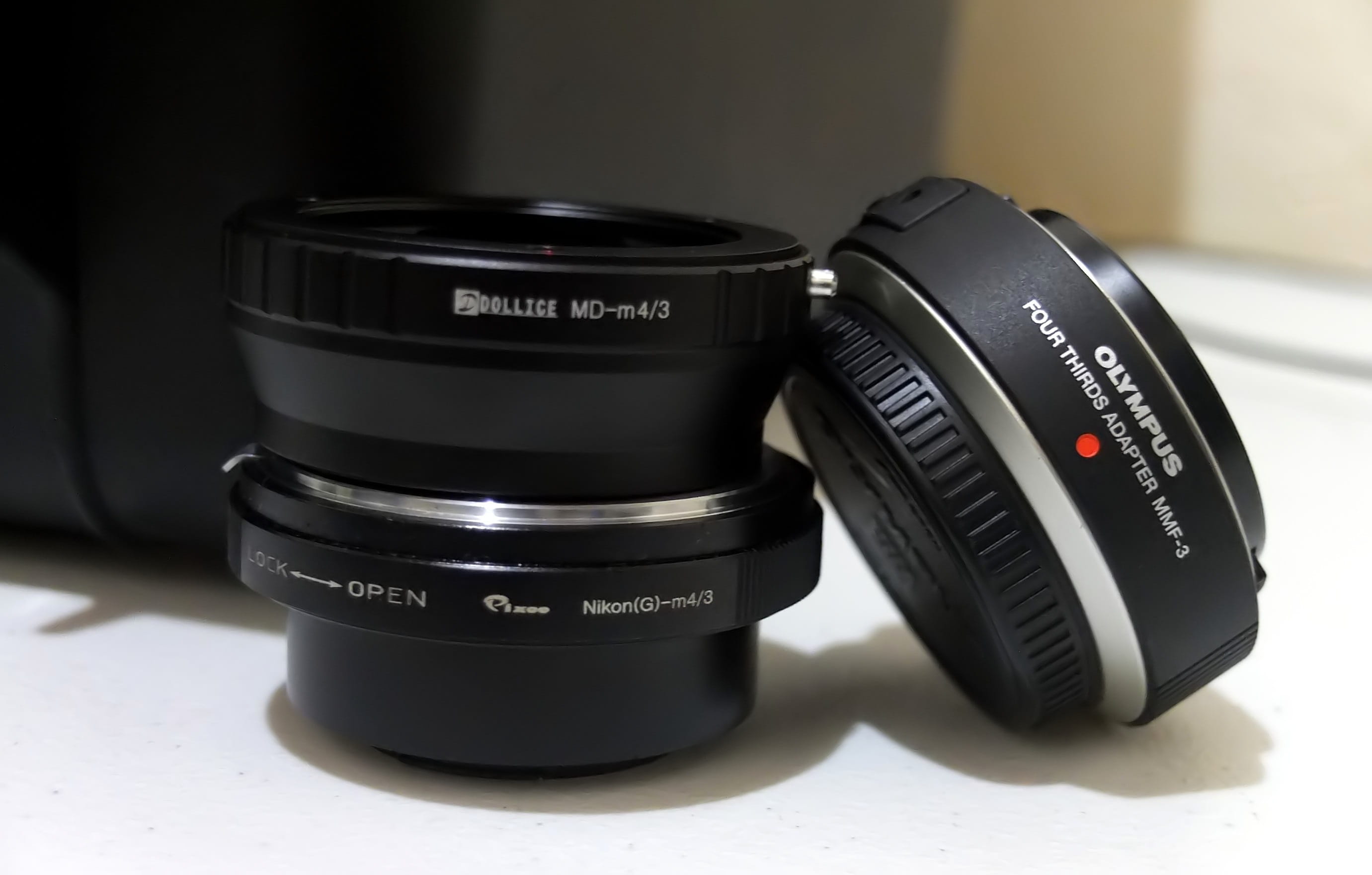photography themes, olympus, minolta, lens, number, text, nikon, four third, table, close-up, focus on foreground, lens - optical instrument, single object, HD Wallpaper